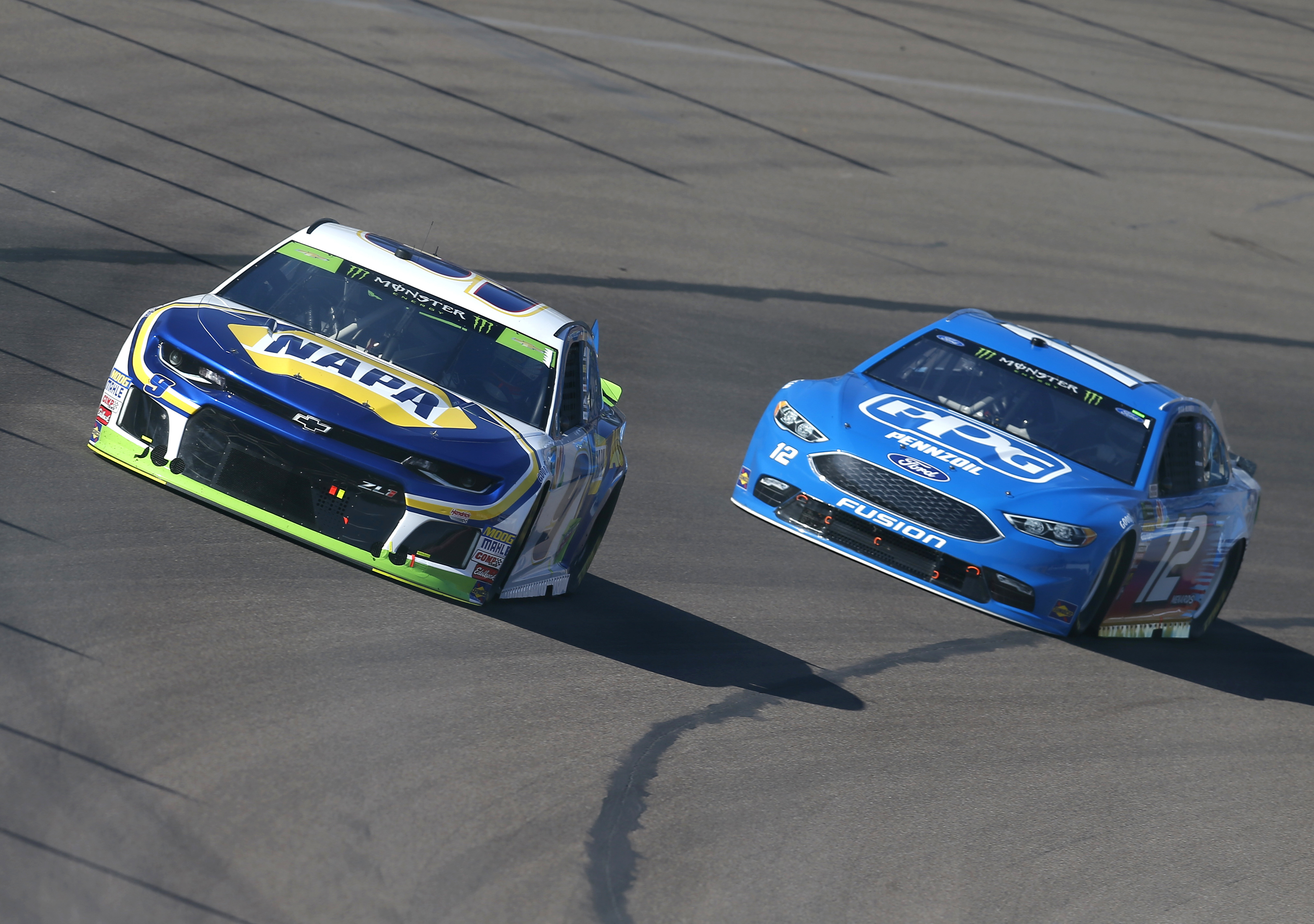 The Latest: Harvick gets flat tire while leading at Phoenix