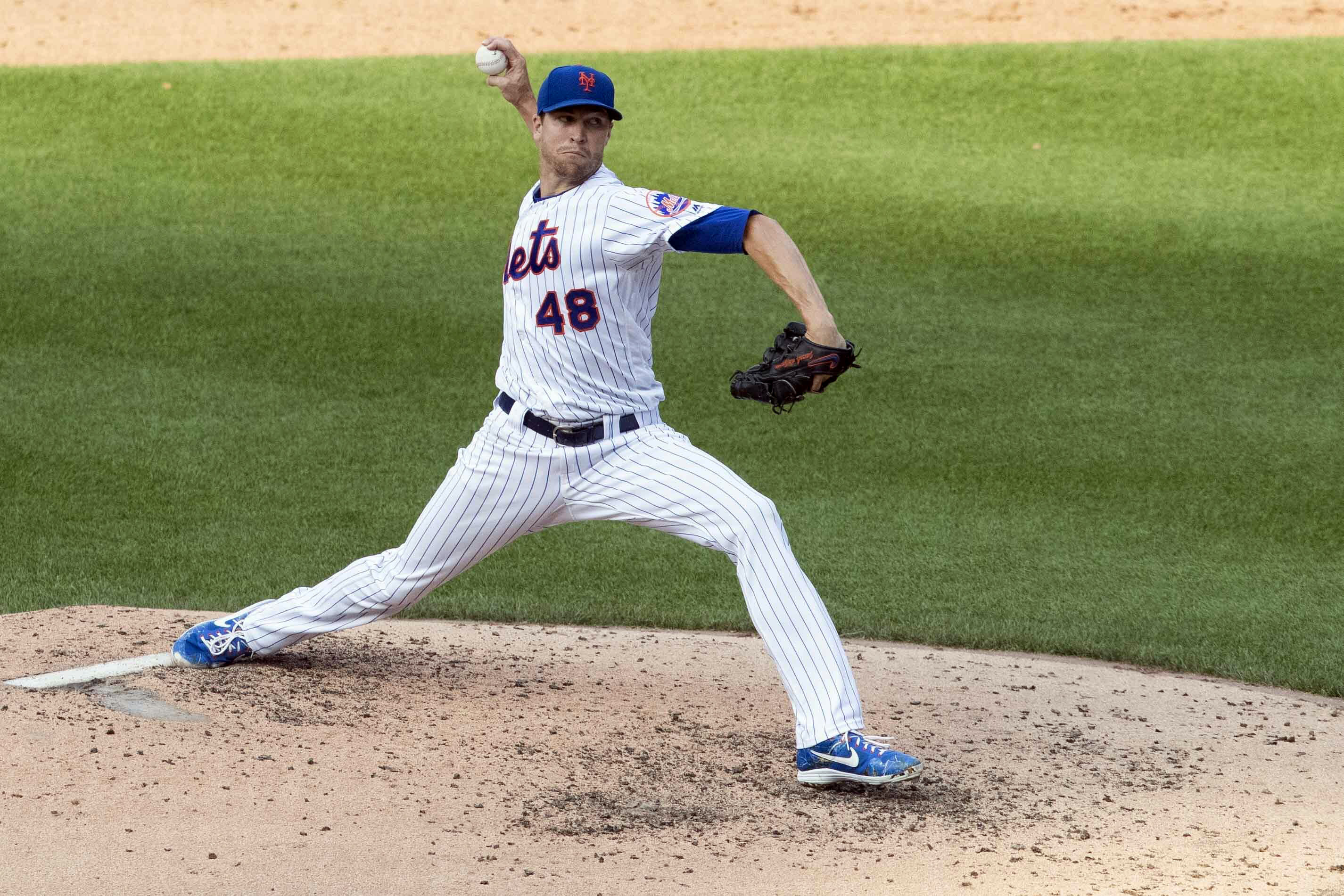 With pitching and power, Mets sweep Marlins, surge over .500