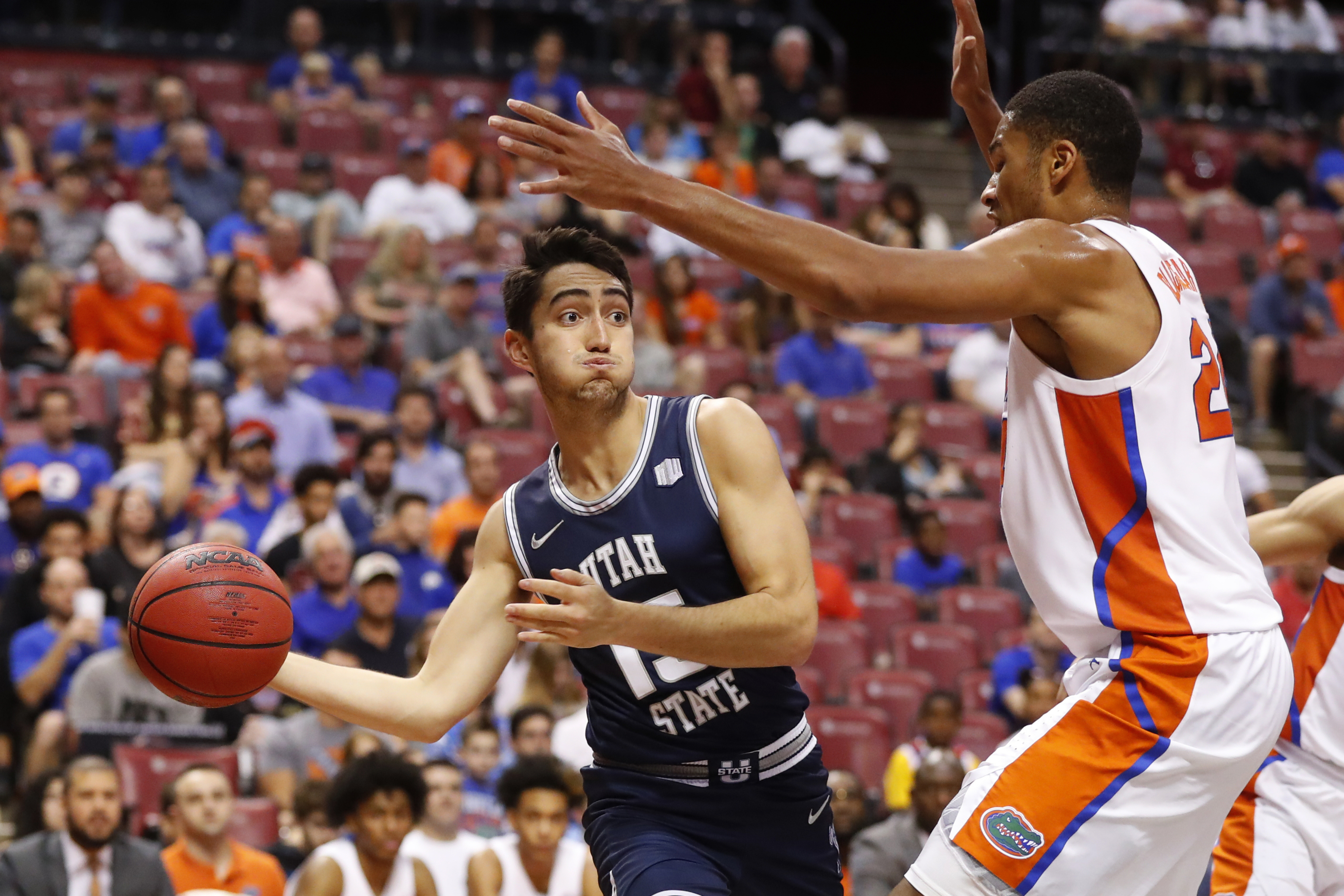 Merrill's 21 points help Utah State beat Florida 65-62