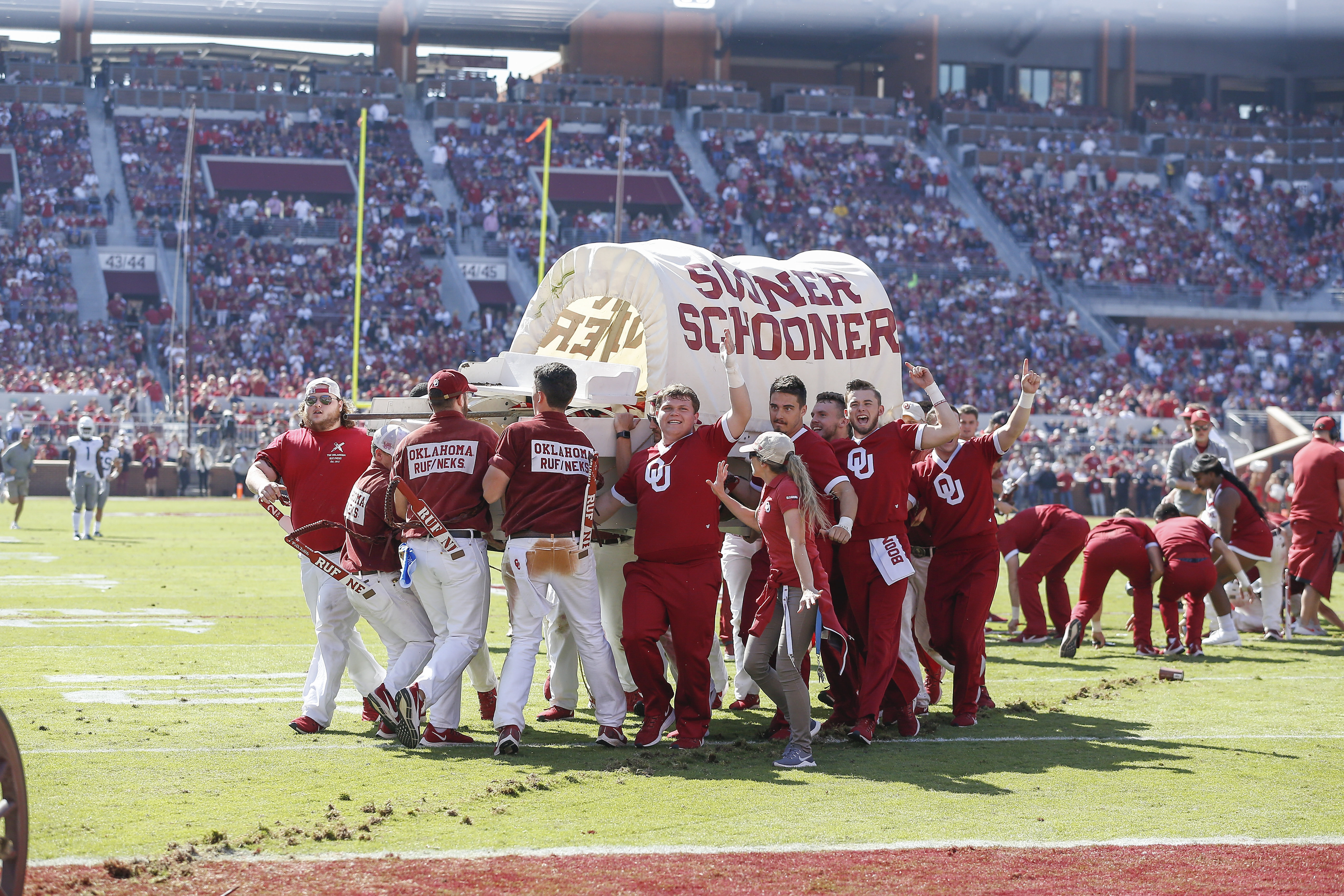 Oklahoma's Sooner Schooner tips over on field; no injuries