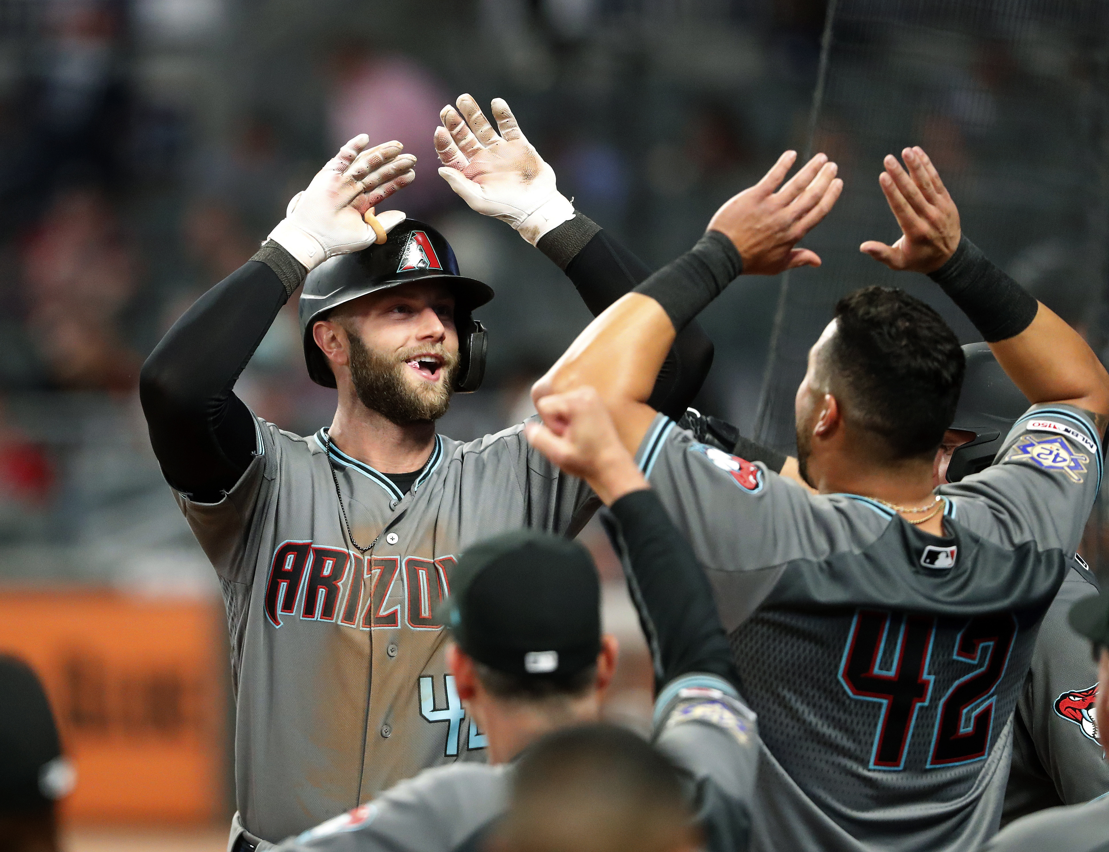 Walker homers leading off 9th, D-Backs beat Braves 9-6