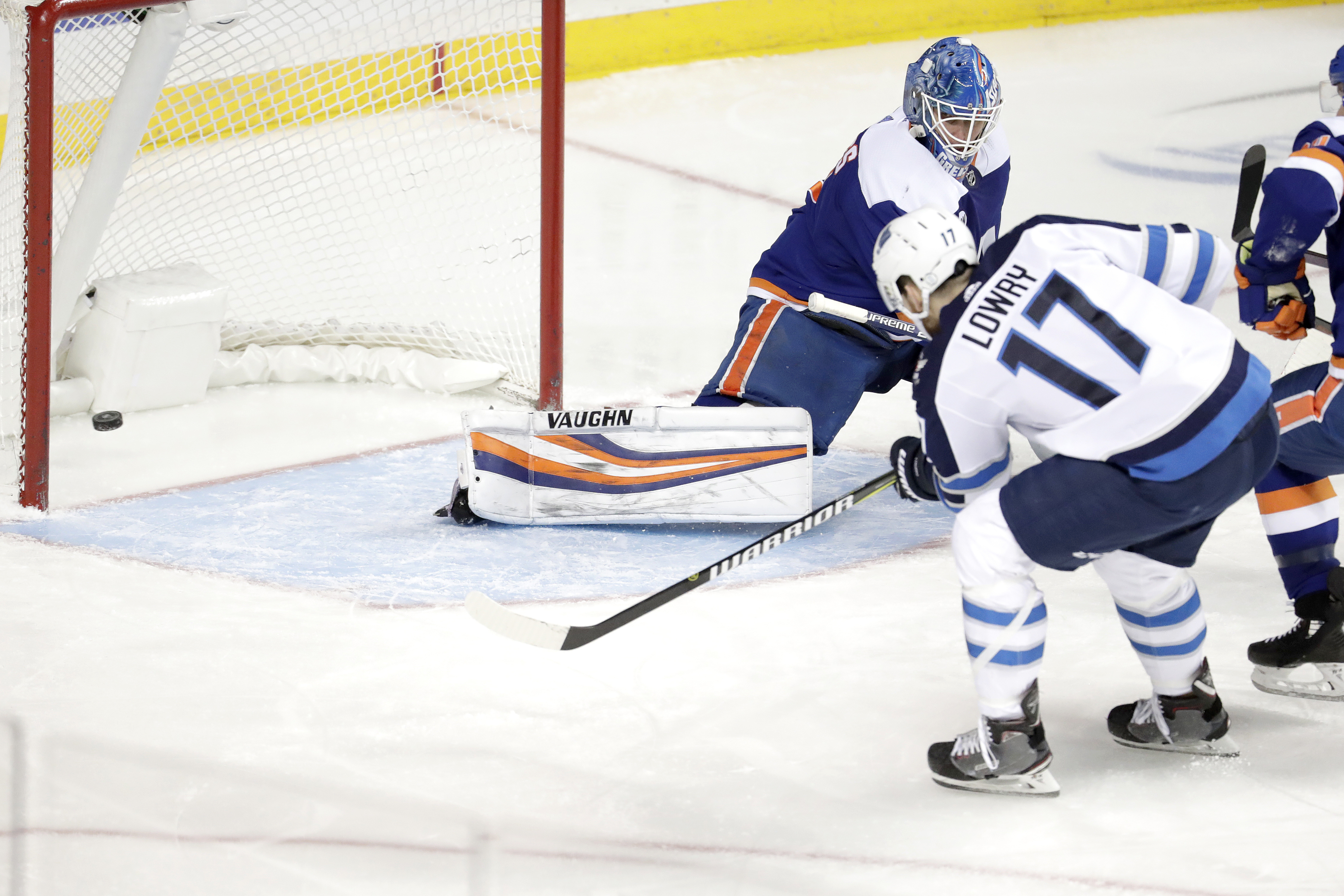 Trouba, Lowry rally Jets to 3-1 win over Islanders