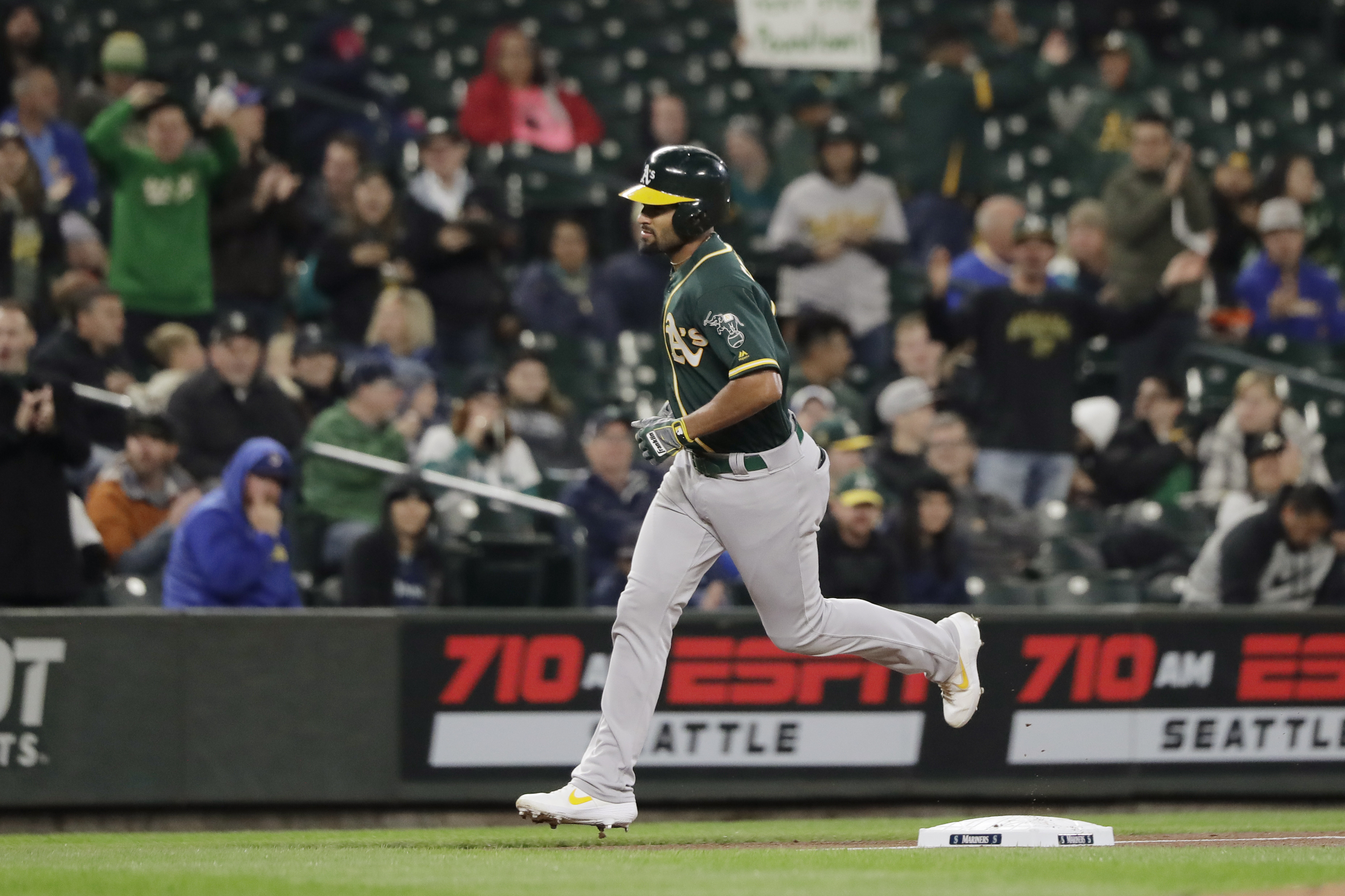 A's clinch wild card spot, tied with Rays after loss to M's