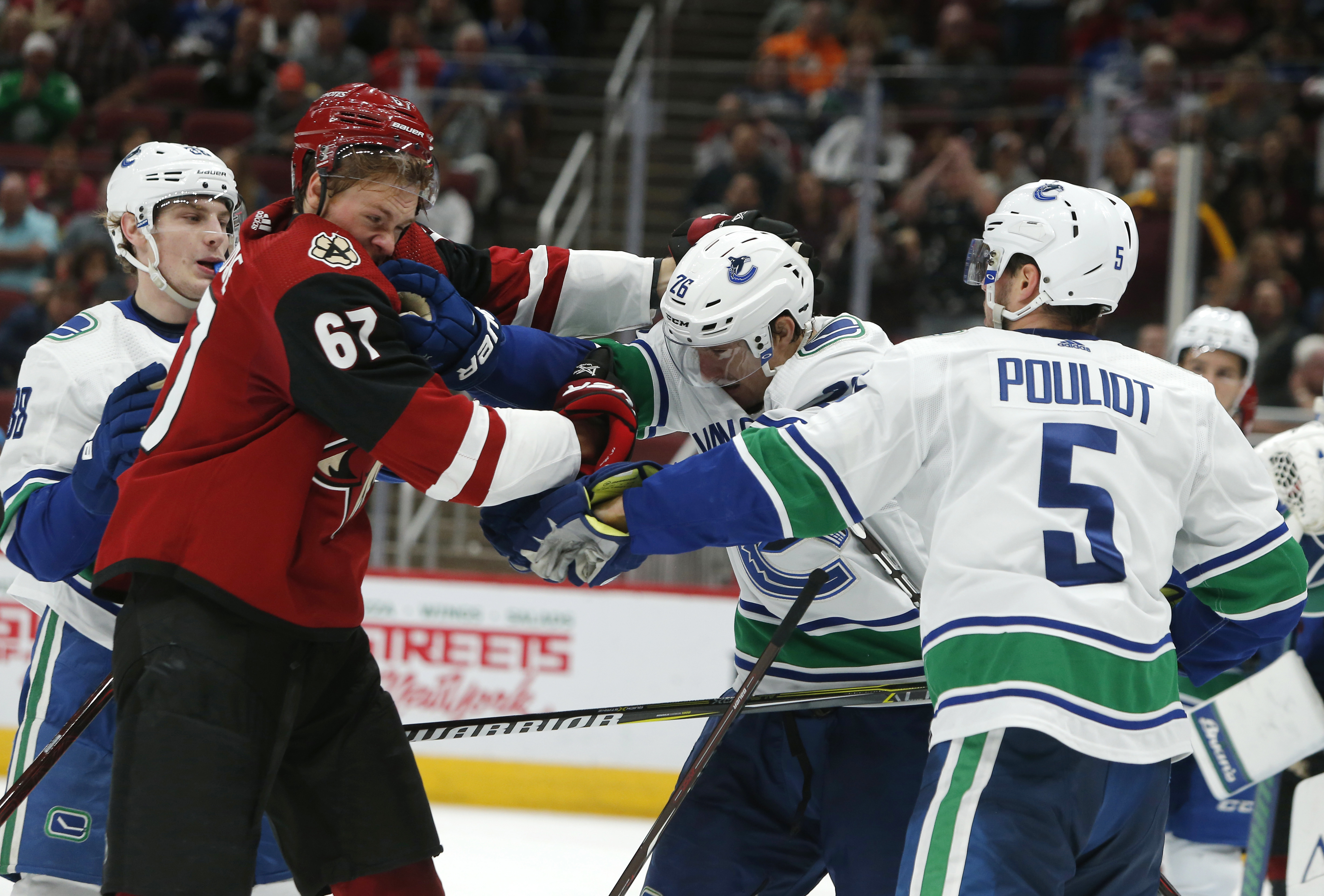 Coyotes score 3 third-period goals, top Canucks 4-1