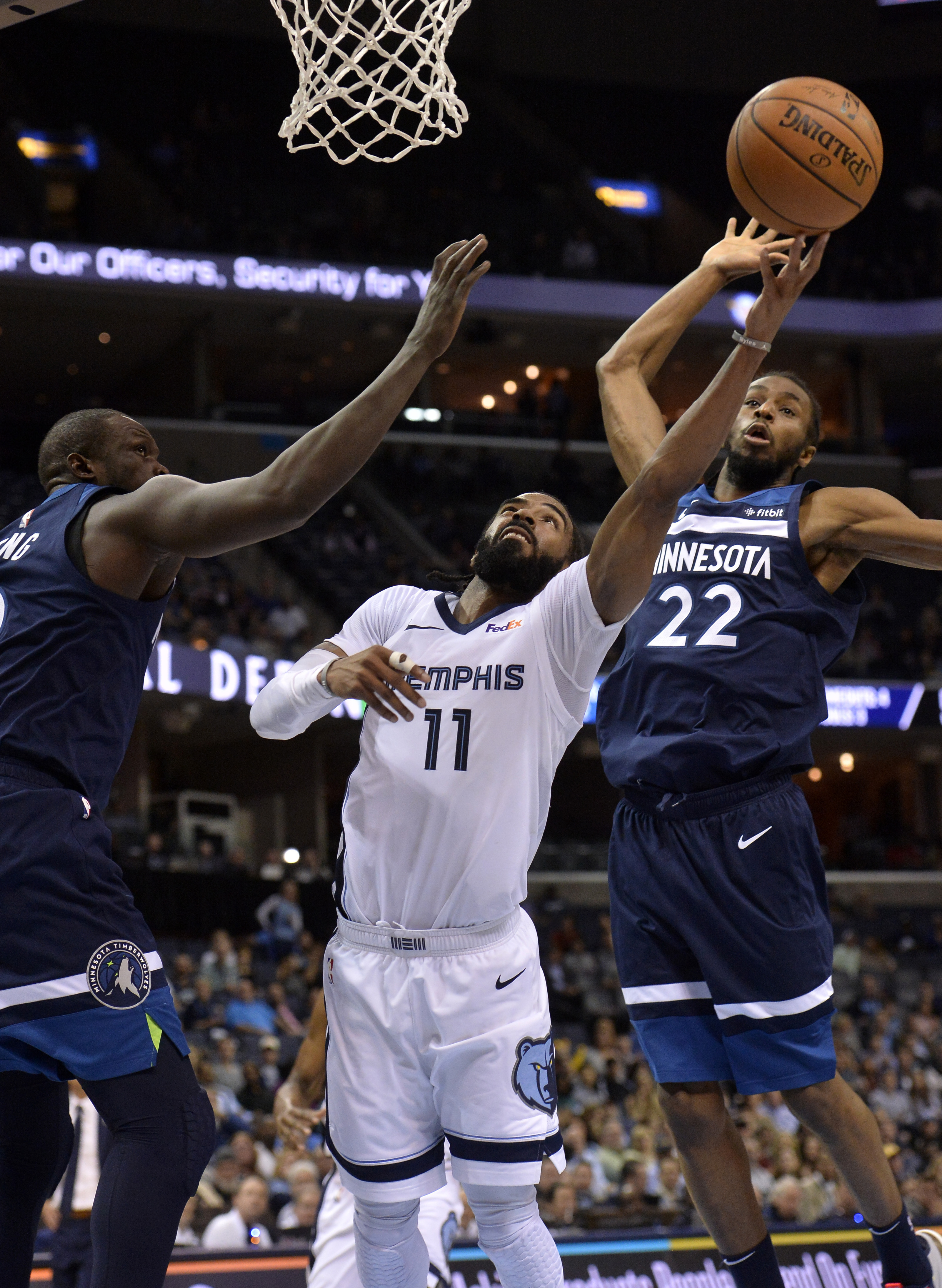 Conley, Holiday help Grizzlies beat Timberwolves 108-106