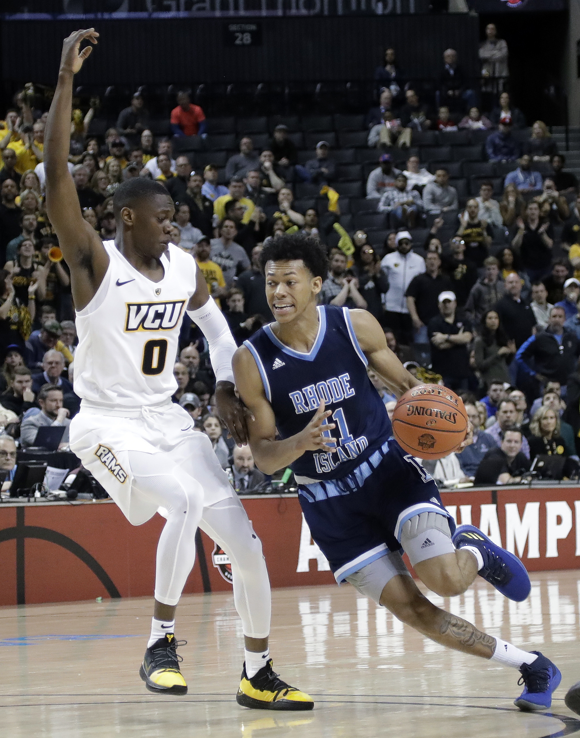 Rhode Island upsets VCU 75-70 in A-10 quarterfinals