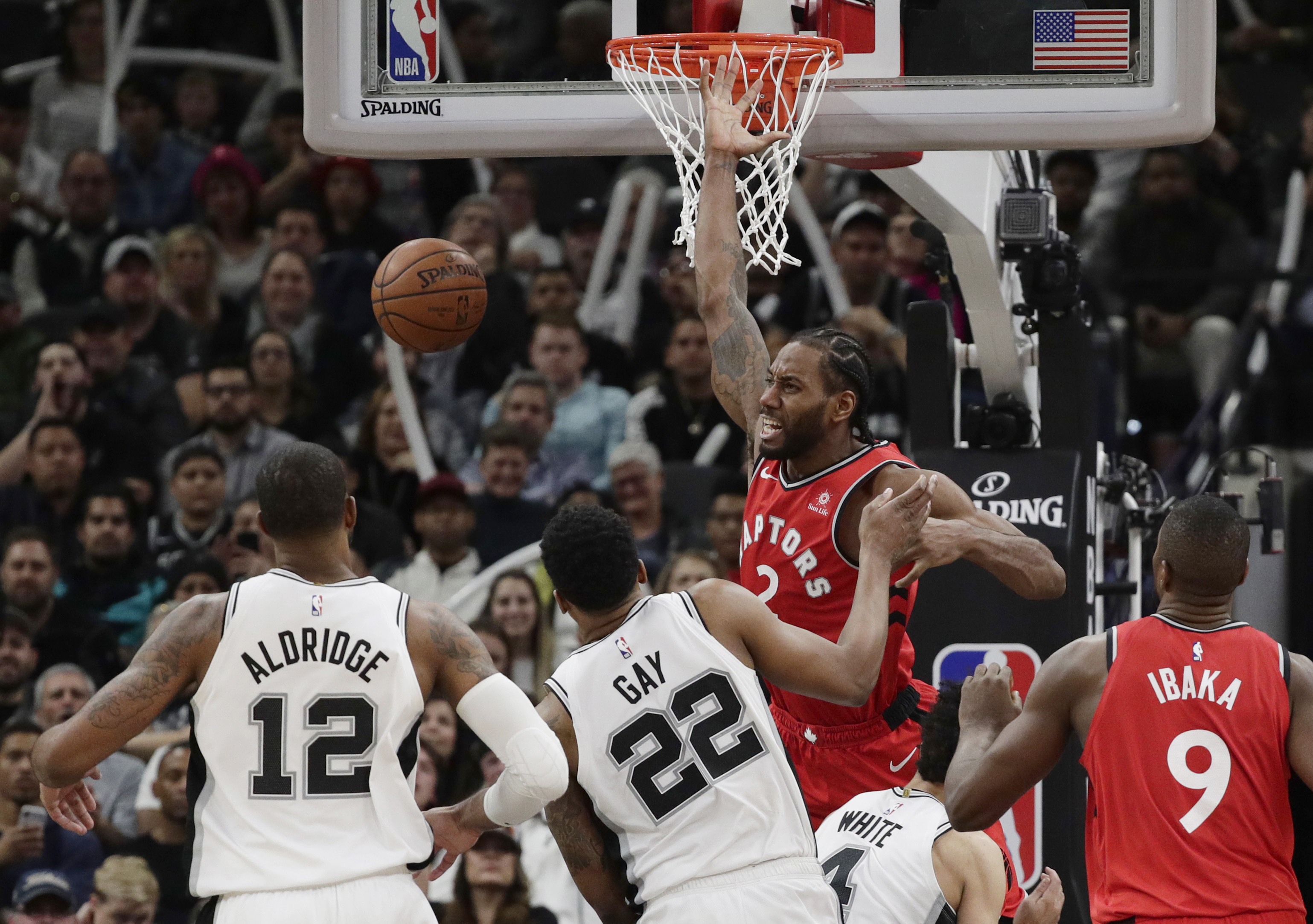 DeRozan has triple-double, Spurs win  in Leonard’s return