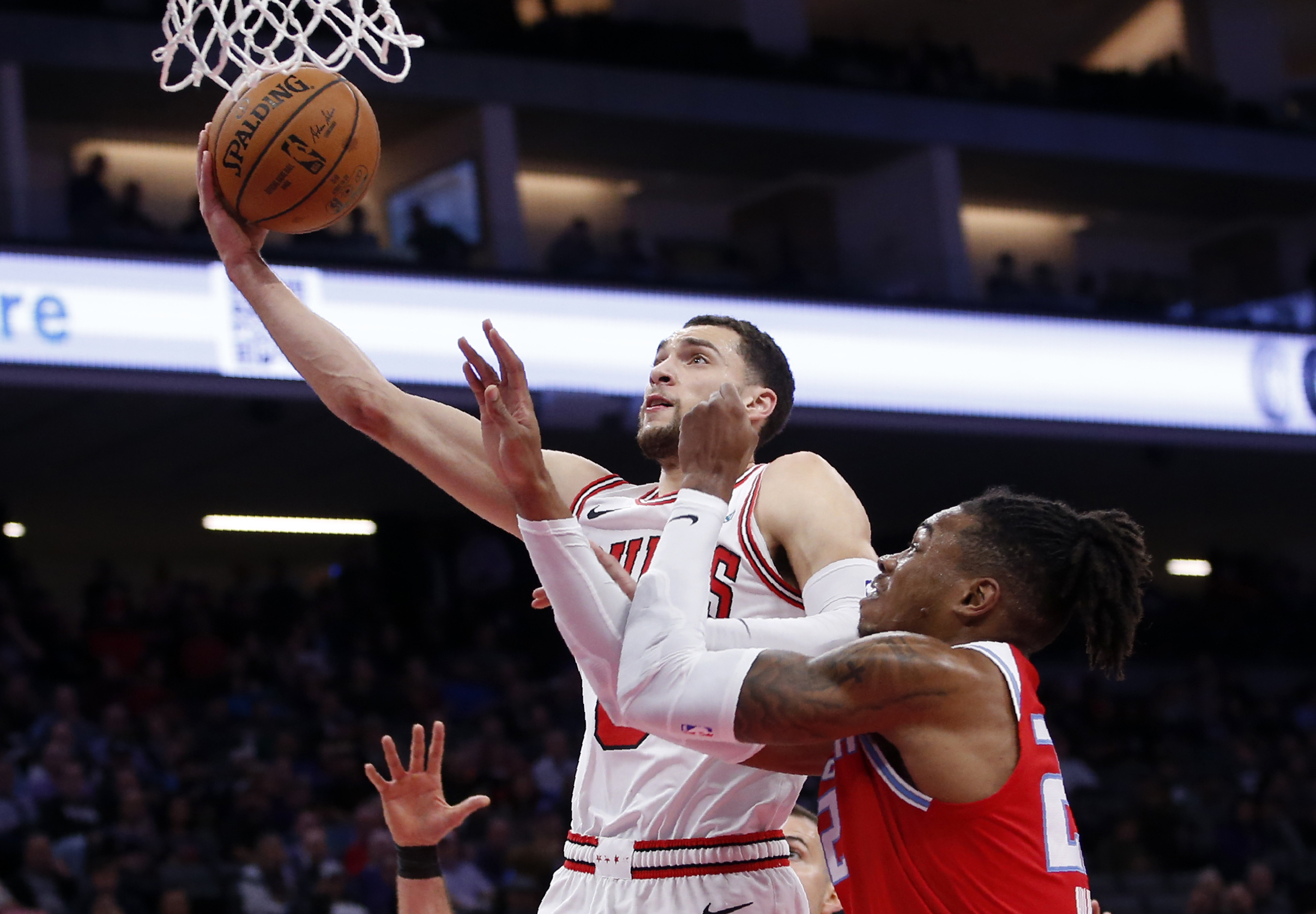 Bulls nearly blow big lead, hold off Kings 113-106