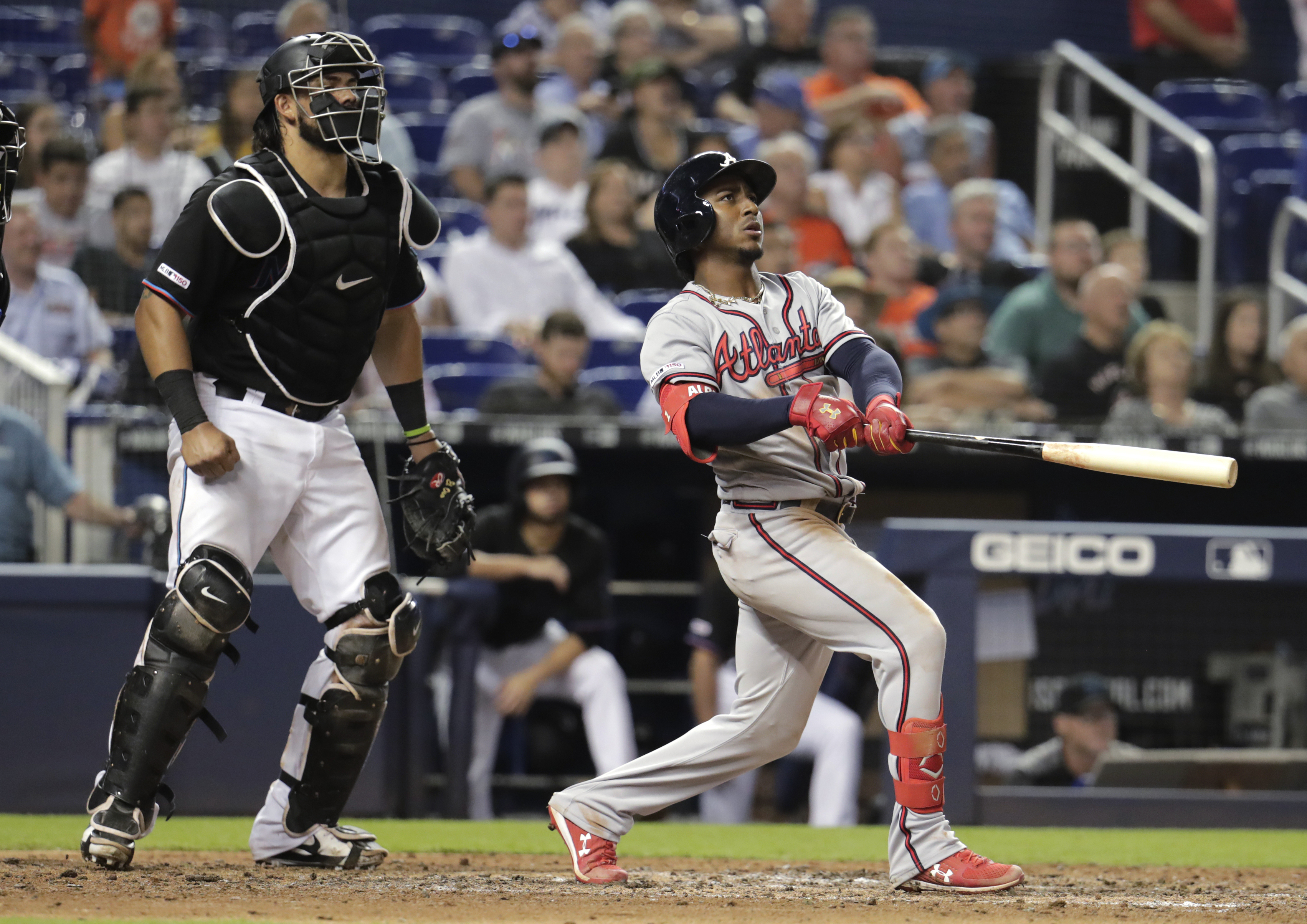 Albies hits a slam, Braves roll past Marlins 9-2