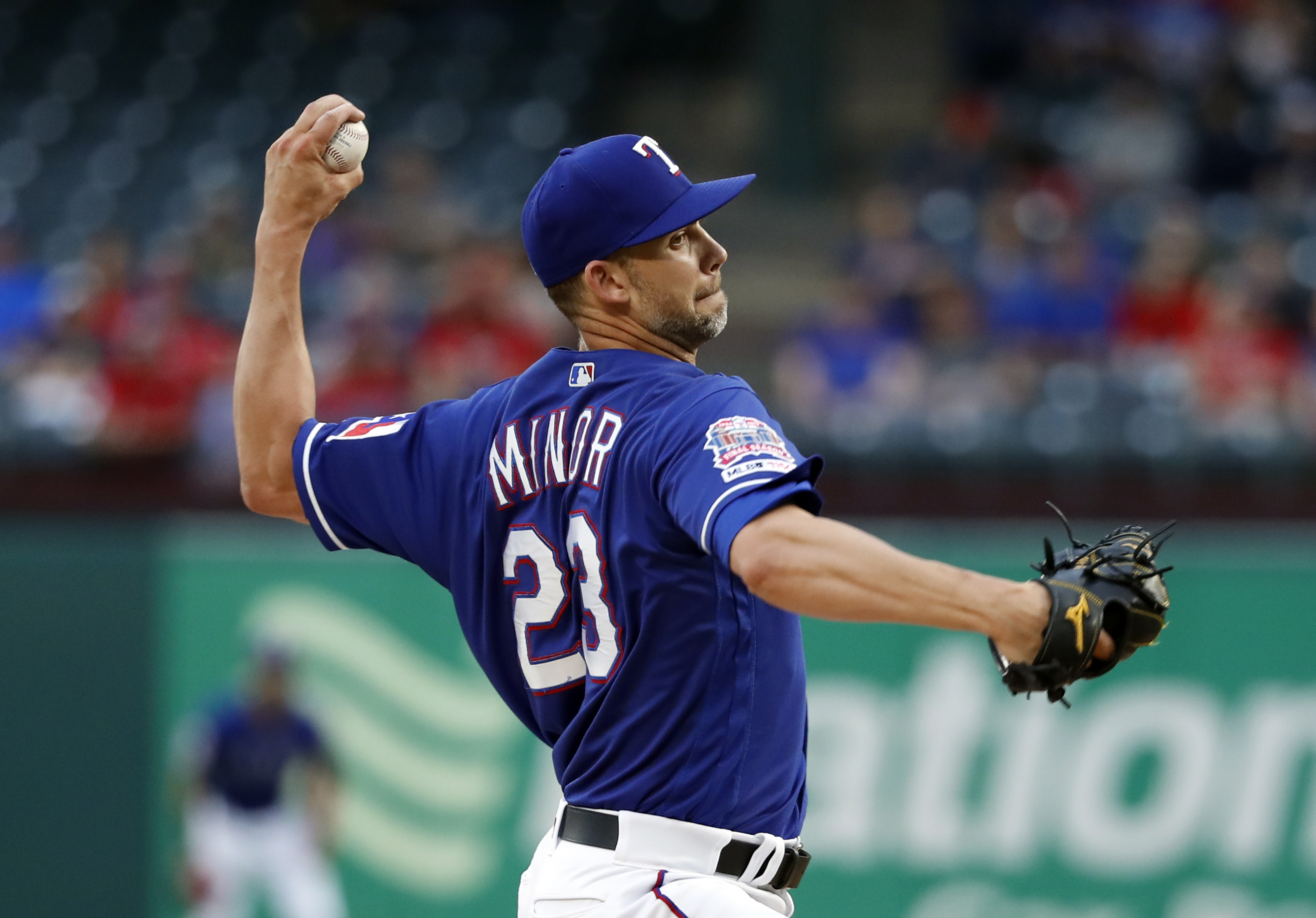 Minor’s 3-hitter is 1st career shutout, Rangers top Angels