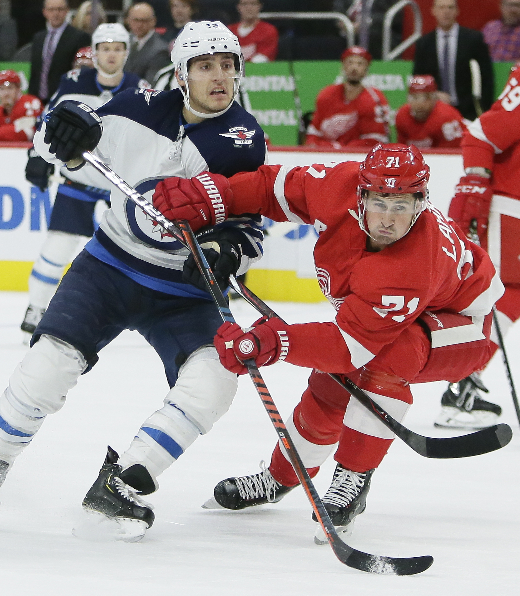 Byfuglien’s late goal gives Jets 2-1 win over Red Wings