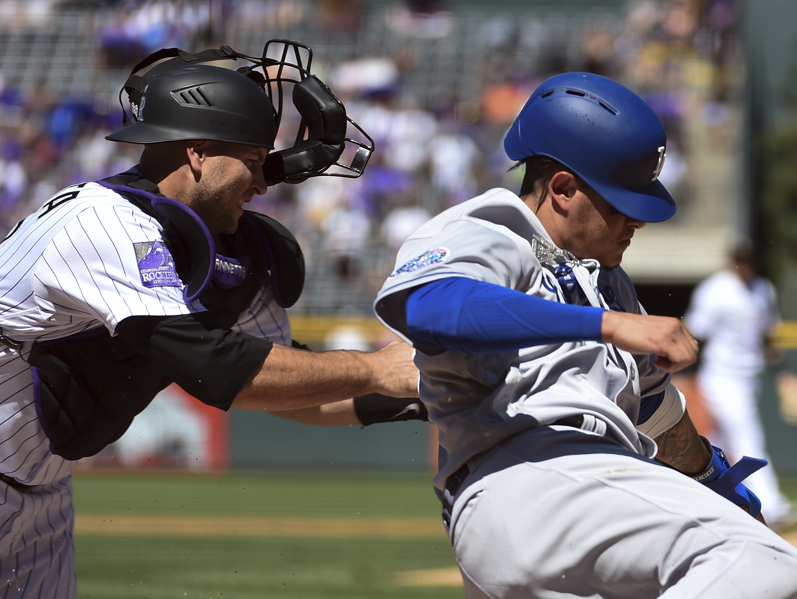 Turner’s 4 hits lift Dodgers past NL West-leading Rox 9-6