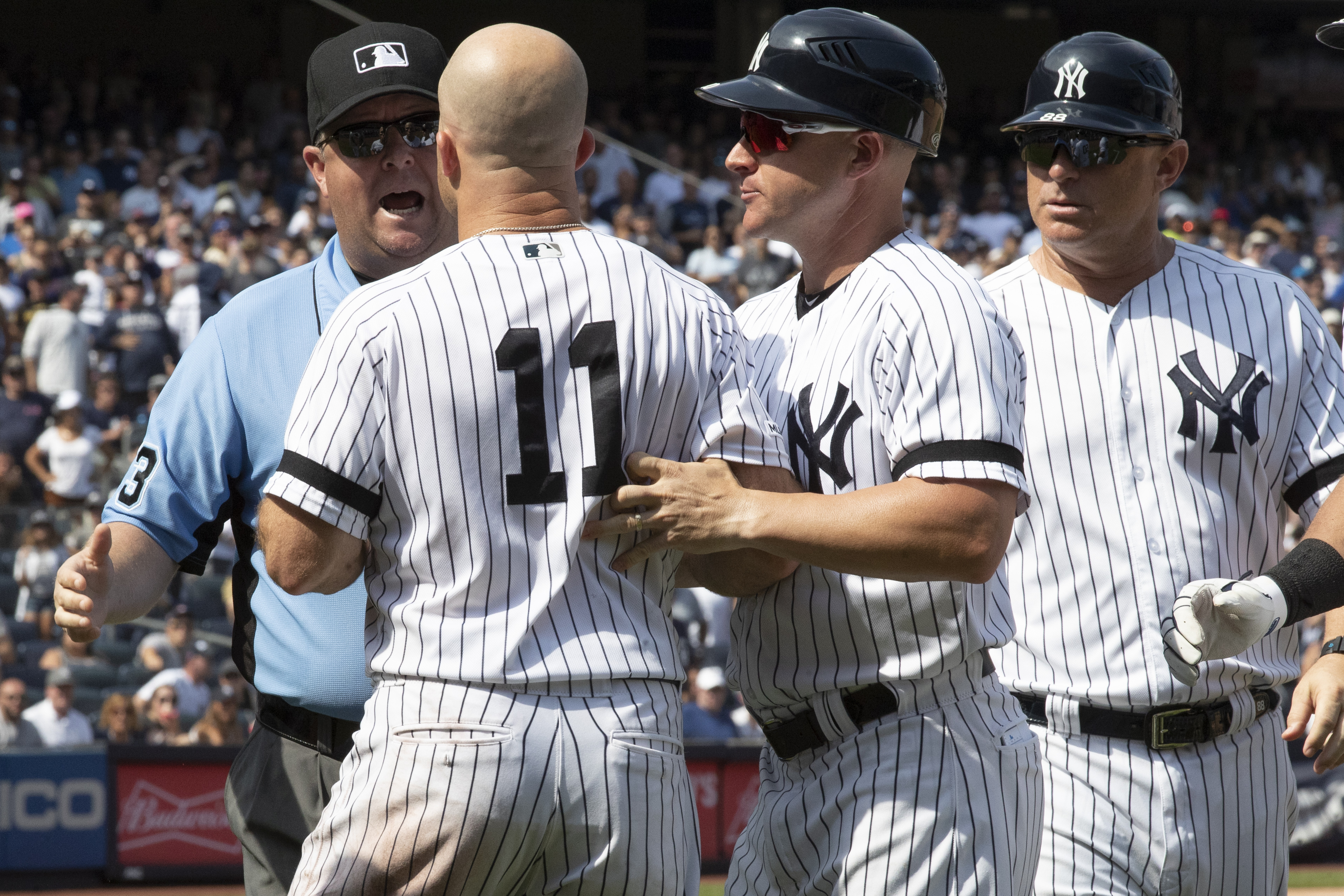 Boone, Gardner, Yanks again hammer umps, beat Indians 6-5