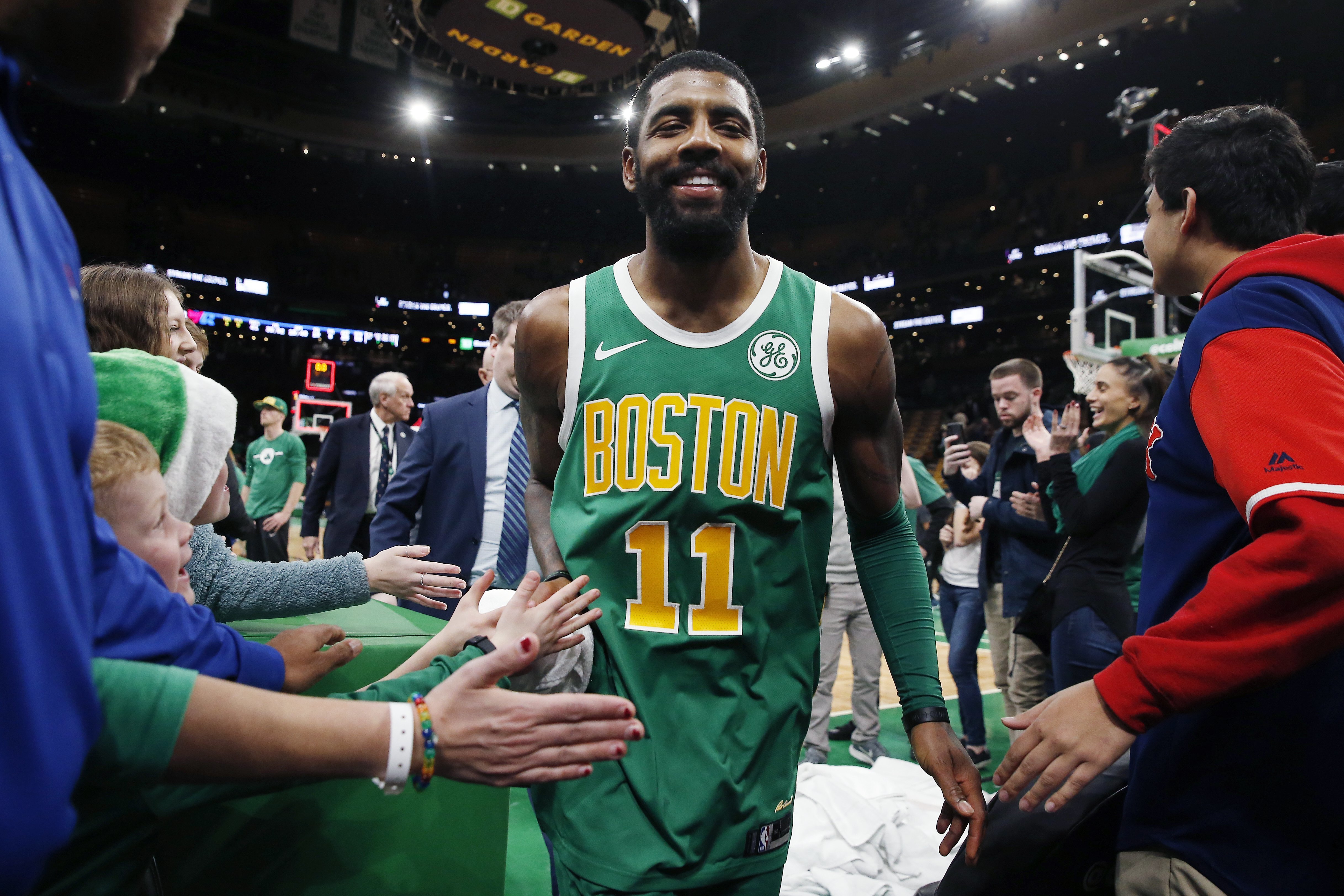 Irving scores 40 as Celtics beat 76ers in OT