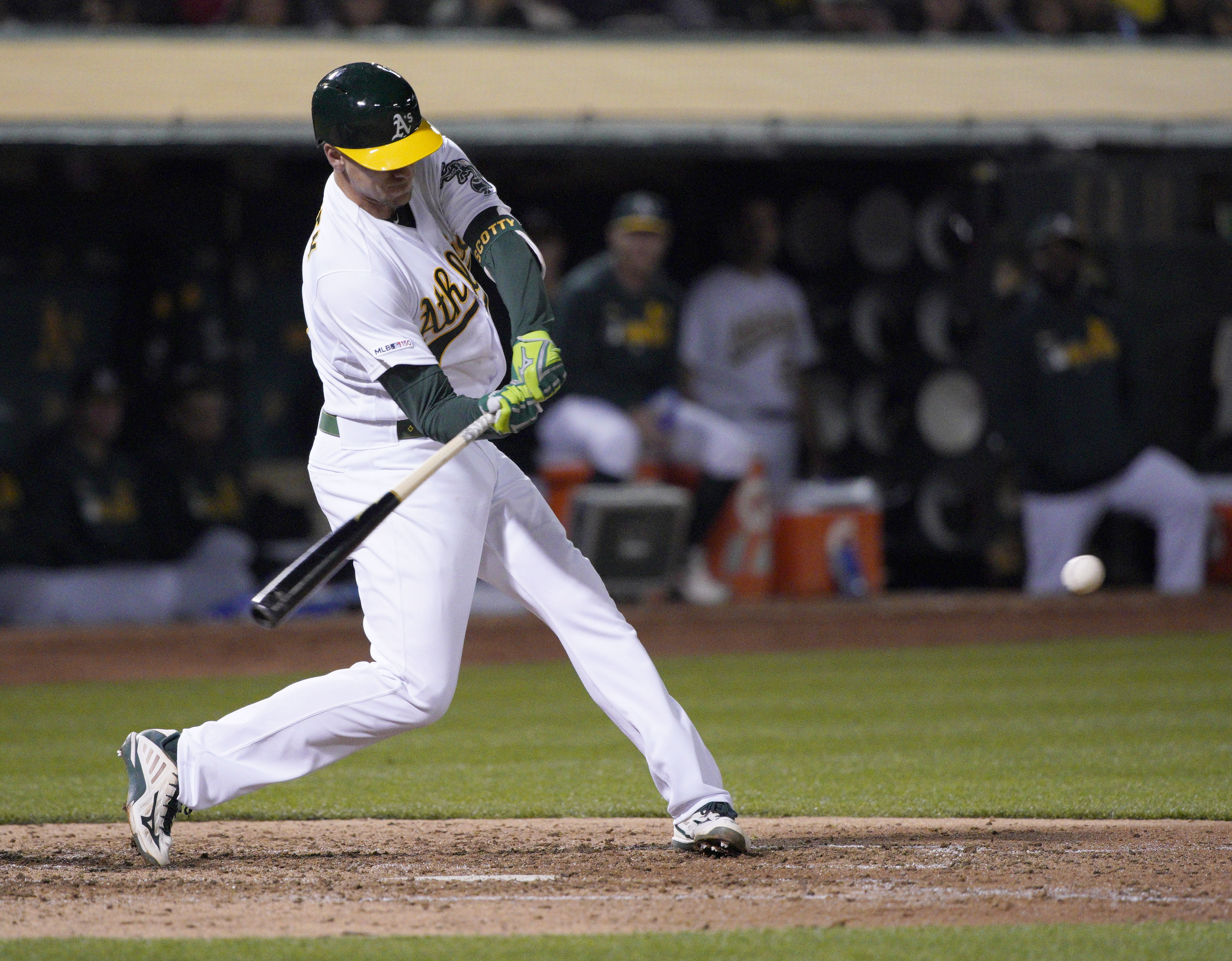 Piscotty homer in 13th lifts A’s past Reds 5-4