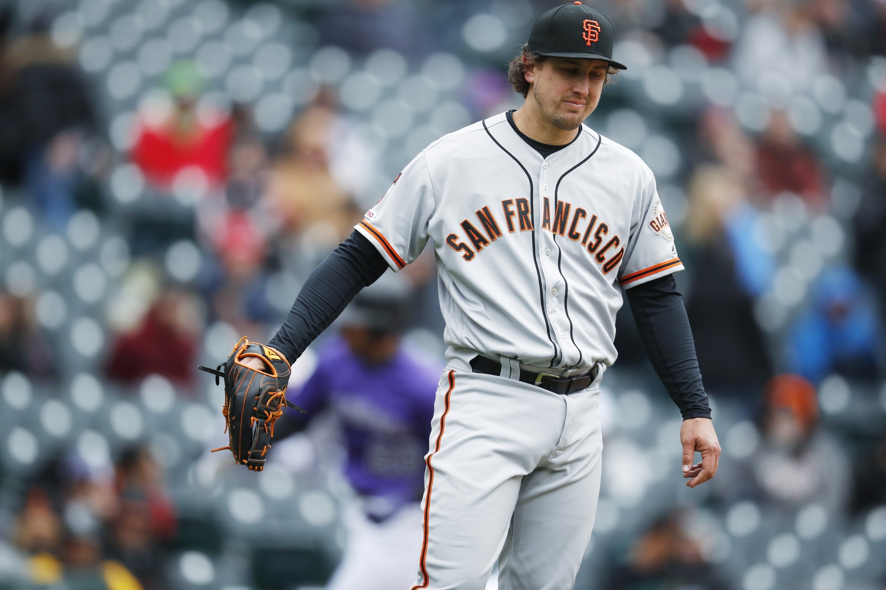 Giants president says lefty Holland’s injury wasn’t ‘fake’
