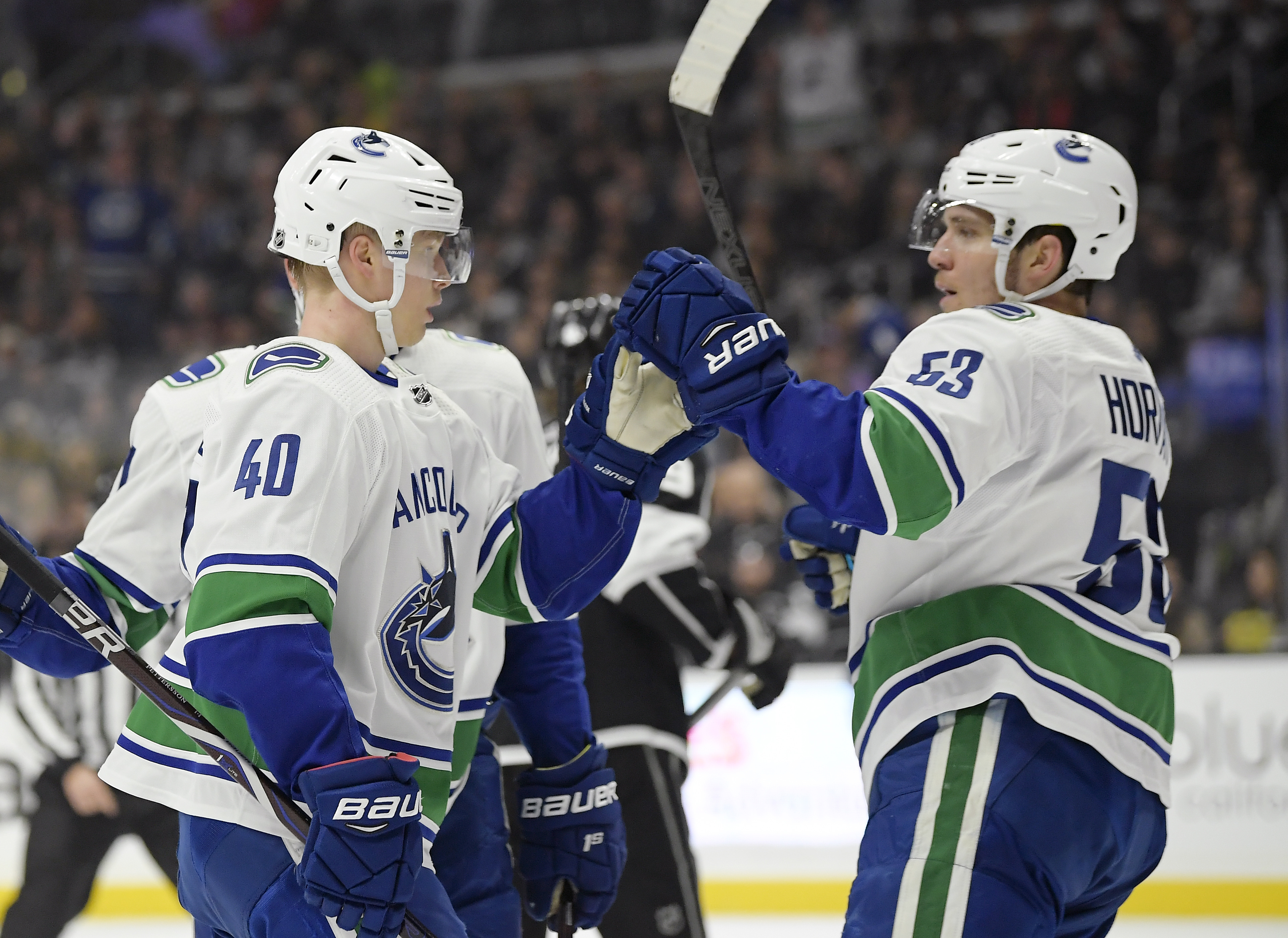 Canucks rally to beat Kings 4-3, end road losing streak at 4