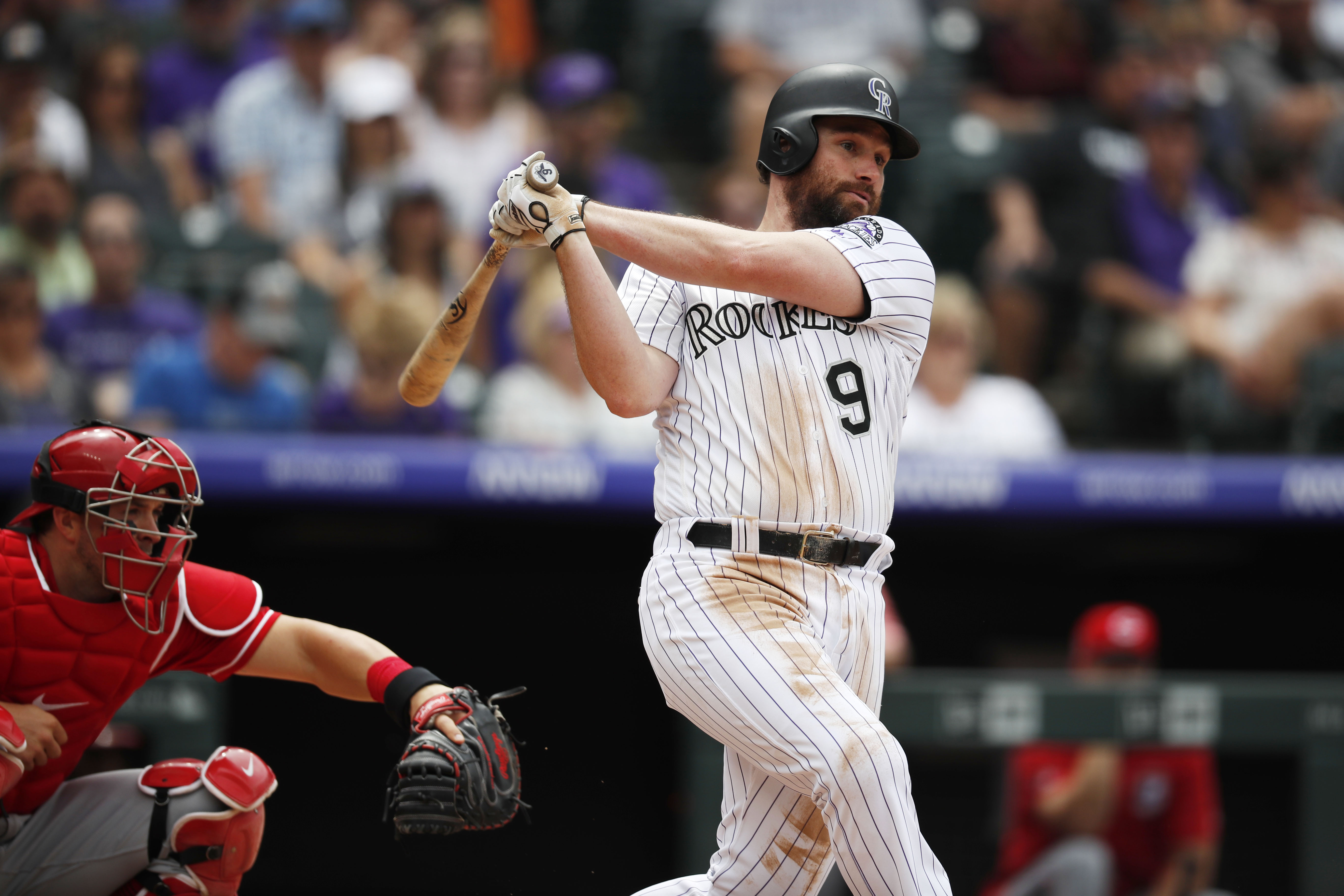 McMahon leads offensive show, Rockies beat Reds 10-9