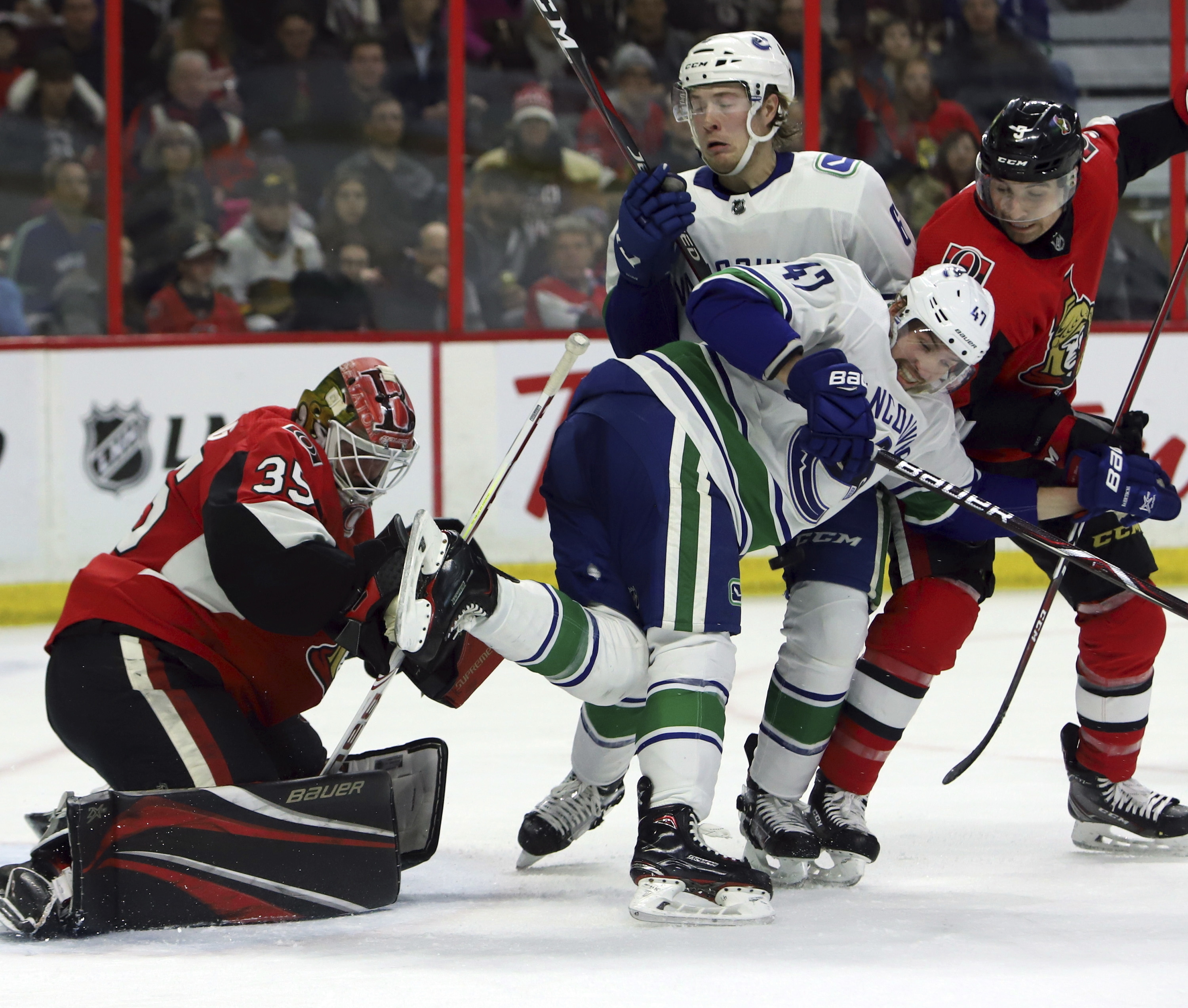 Pettersson finishes hat trick in OT, Canucks beat Sens 4-3