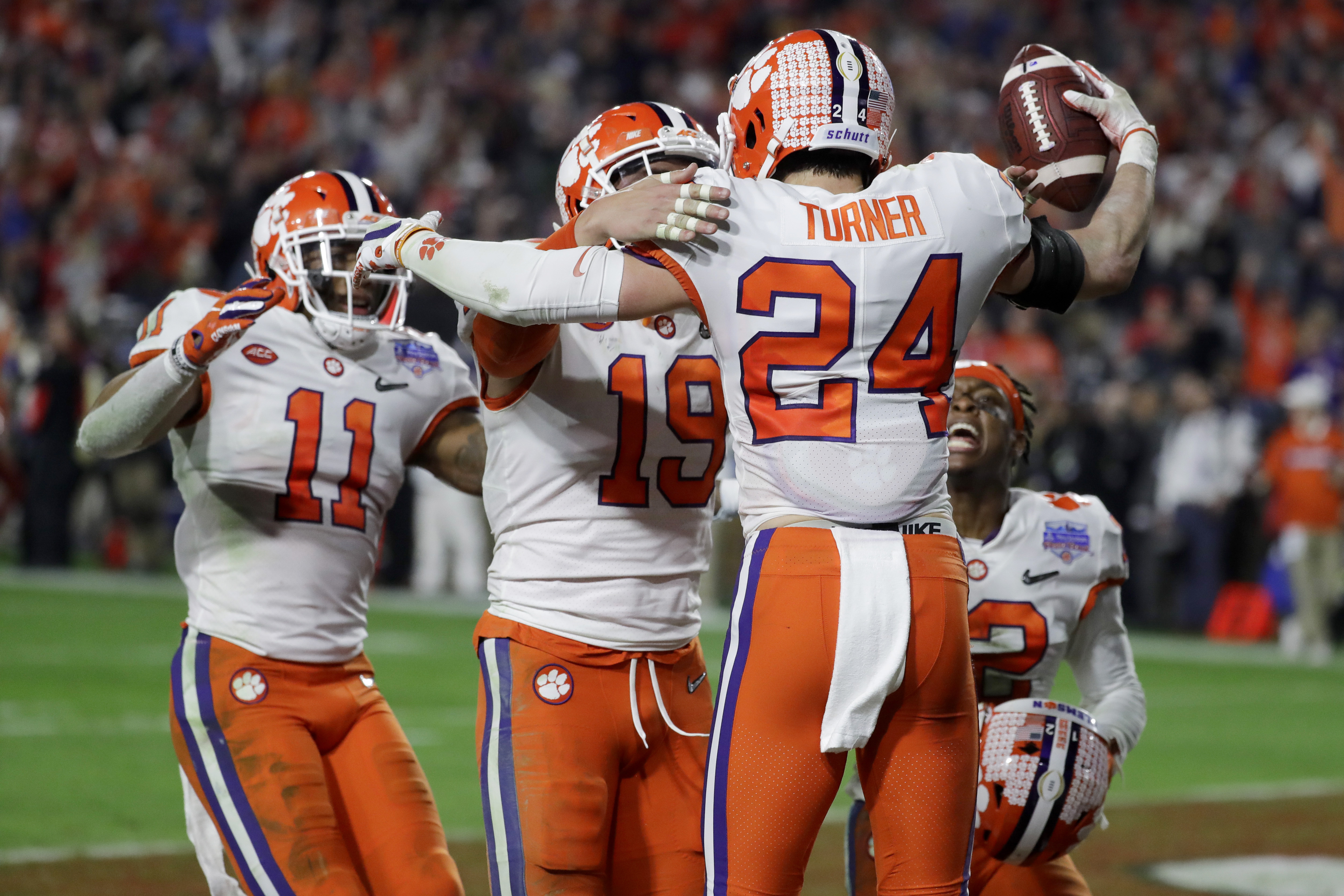 LSU cruises, Clemson survives for title game clash