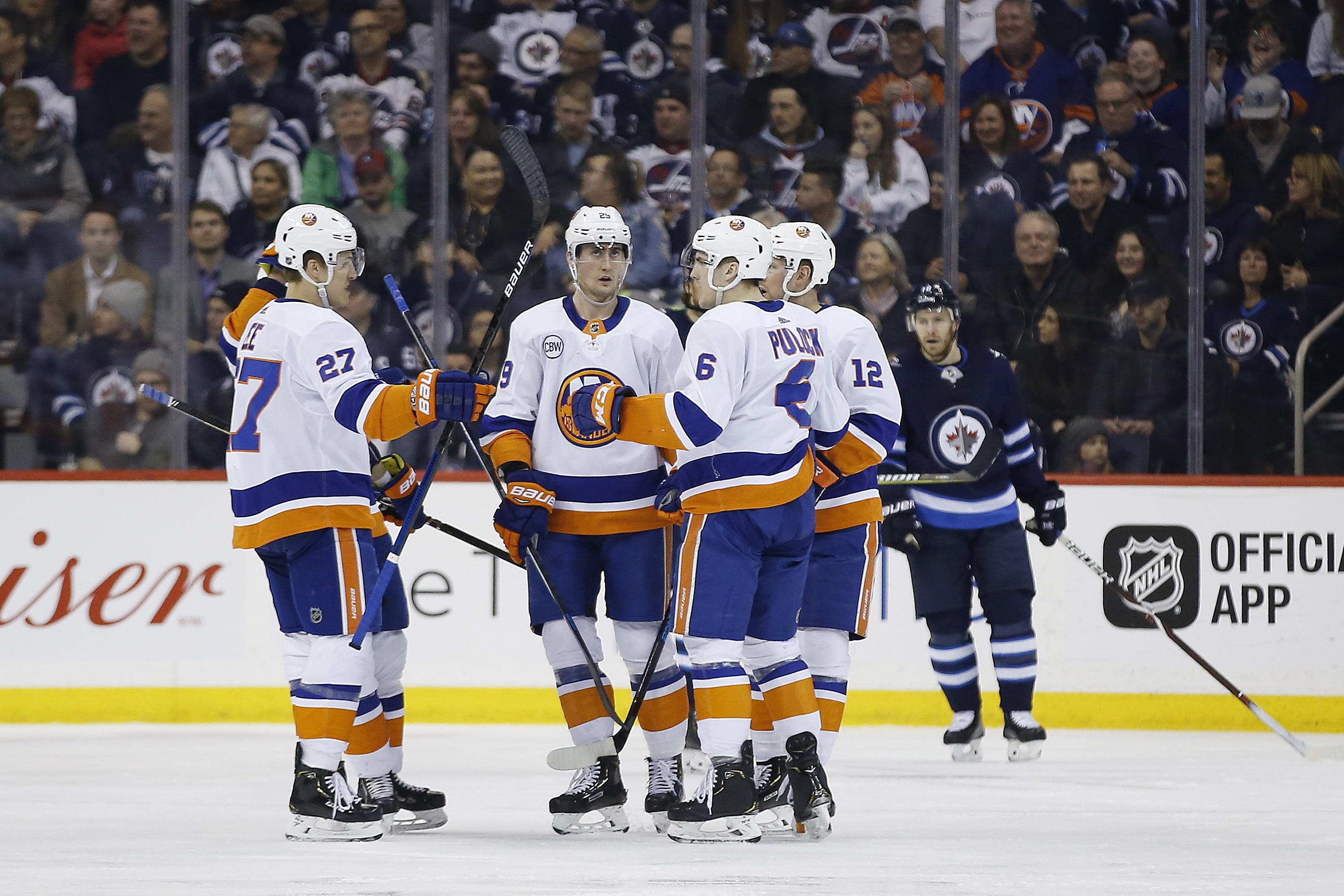 Islanders rally with 2 late goals to beat Jets 5-4