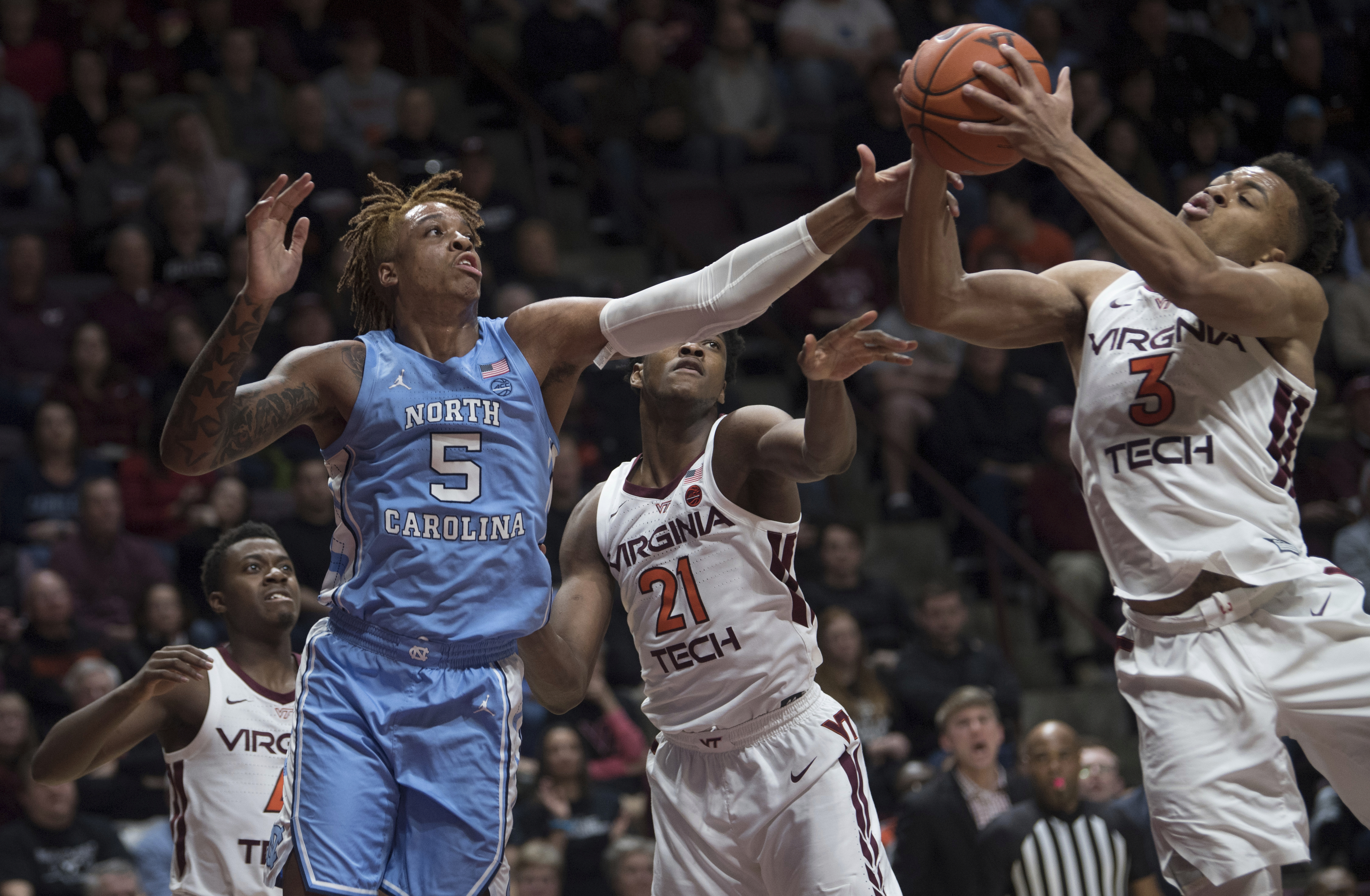 Radford shot lifts Hokies in 2nd OT, 79-77, over UNC