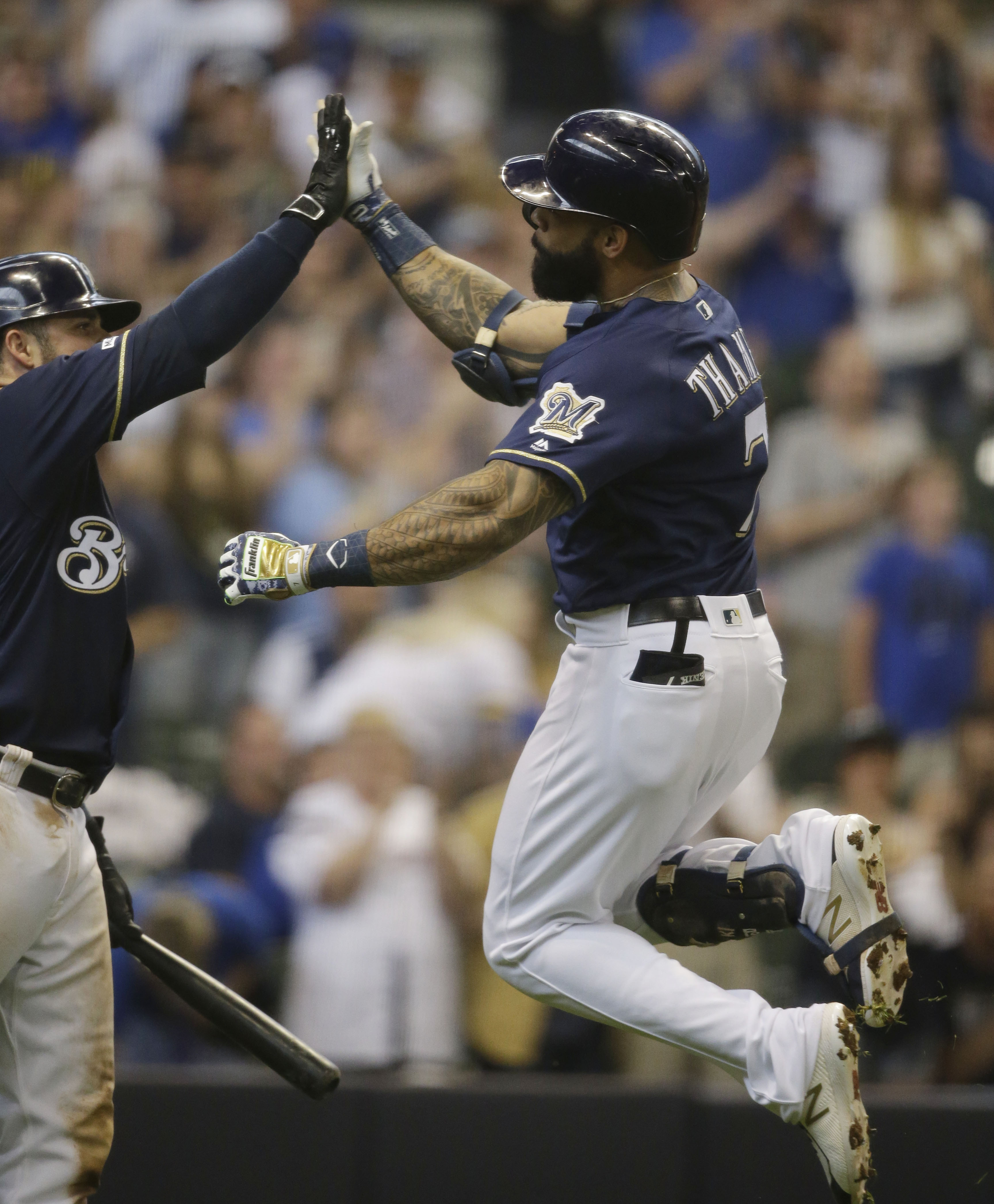 Brewers slip past Pirates 2-1 on Thames' homer in 8th