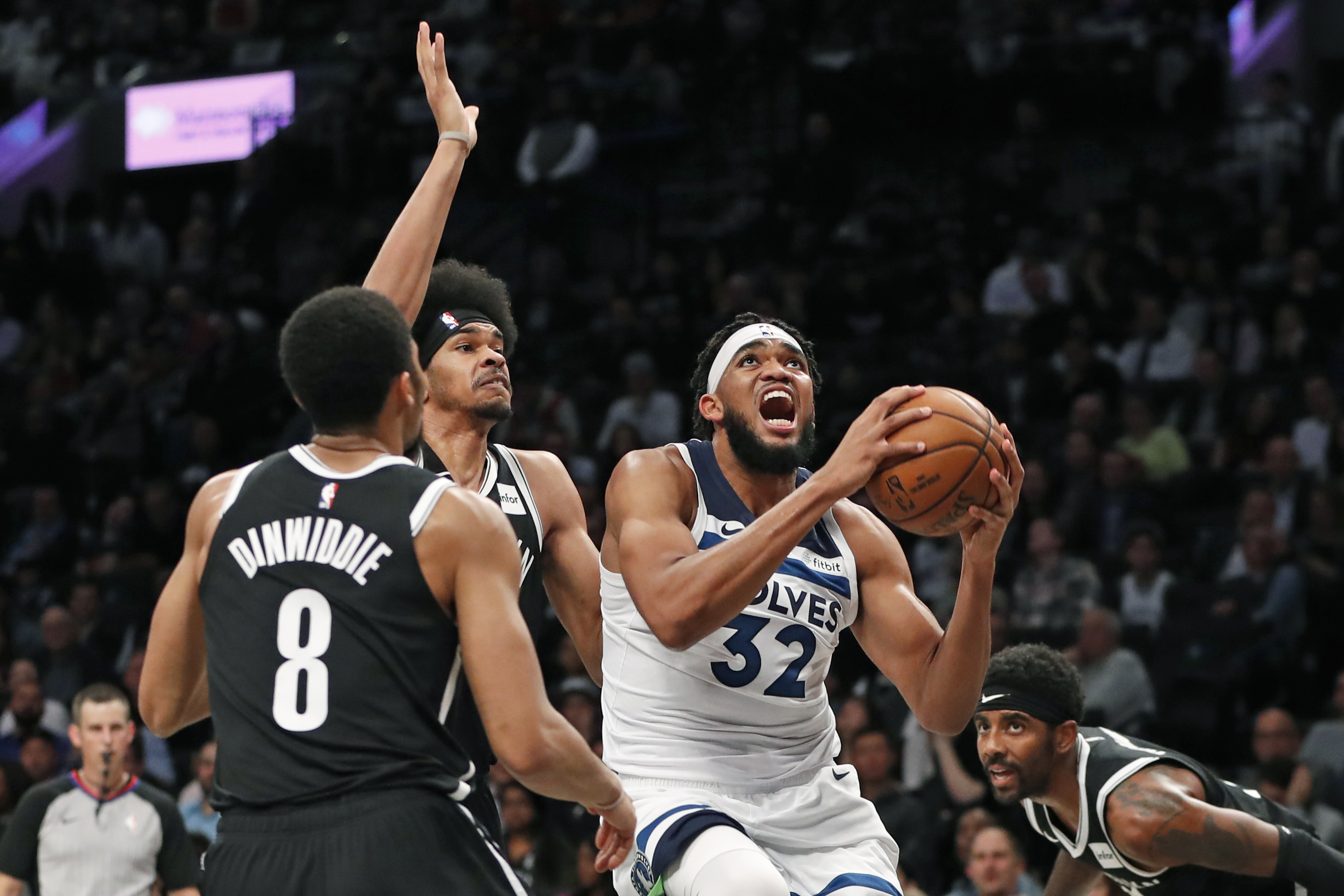 Irving scores 50 but misses last shot, Wolves top Nets in OT