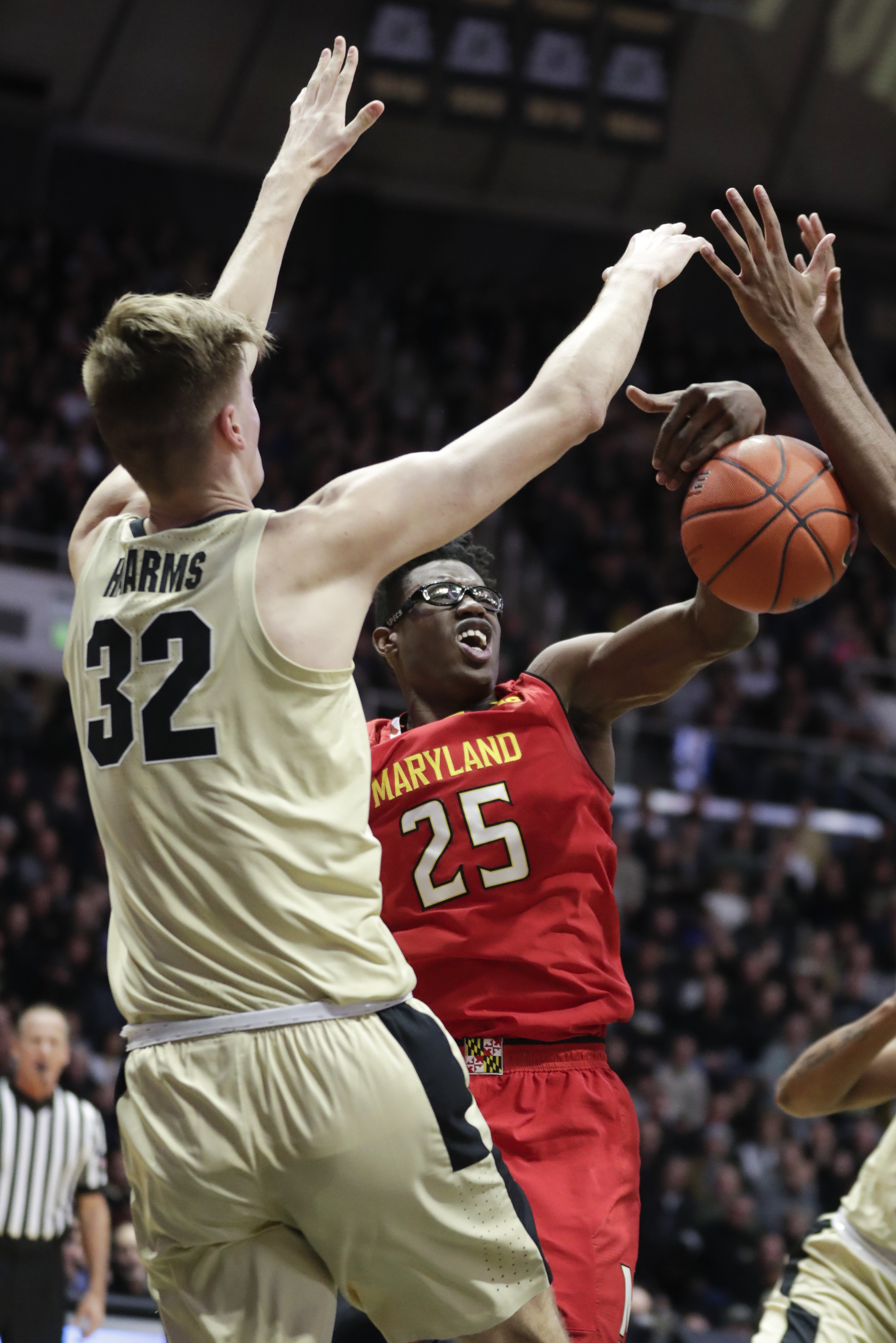 Edwards’ late flurry leads Purdue past No. 23 Maryland 62-60