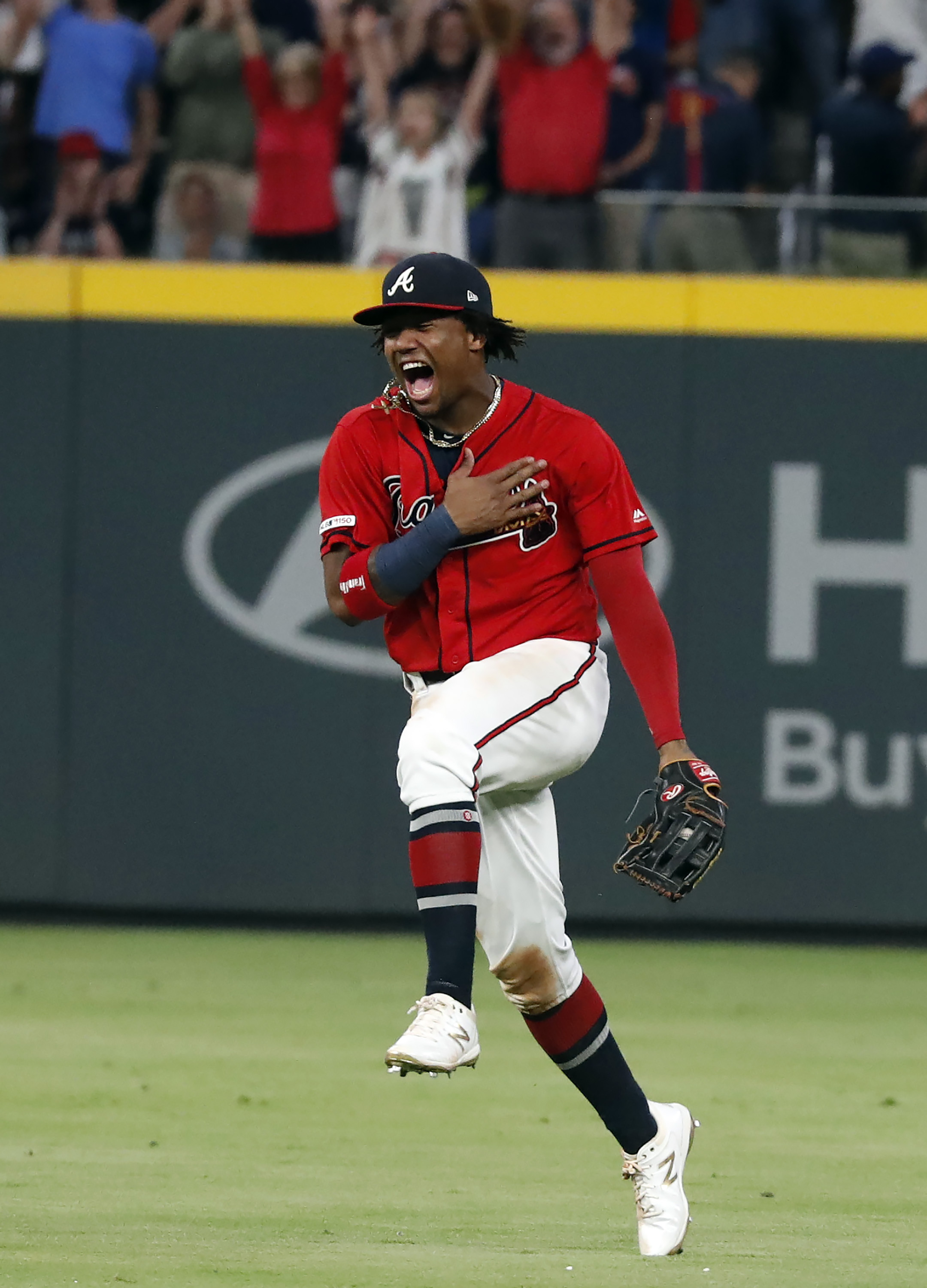 Braves beat Giants 6-0, clinch 2nd straight NL East title