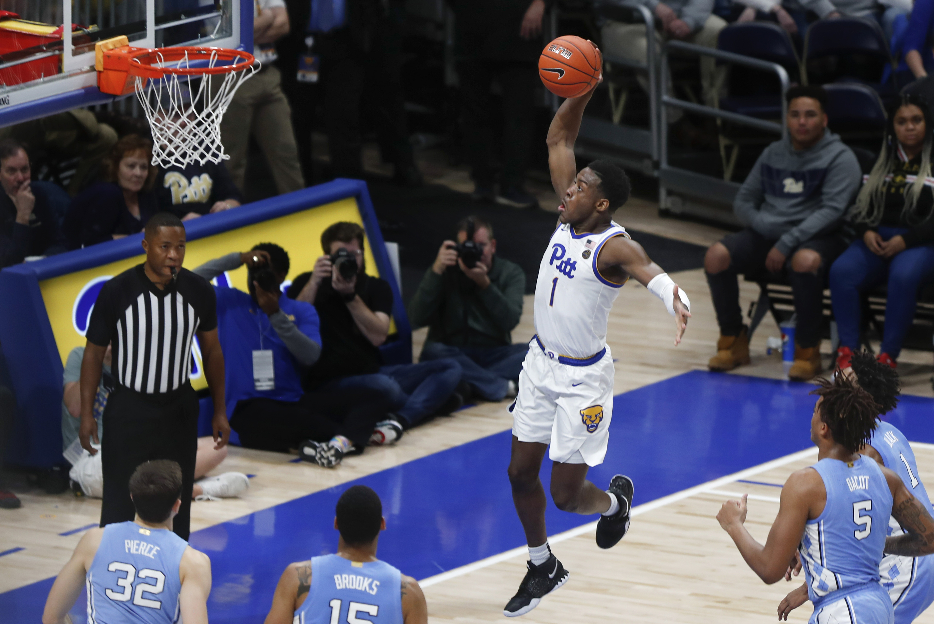 Johnson scores 20, Pitt drills reeling North Carolina 66-52