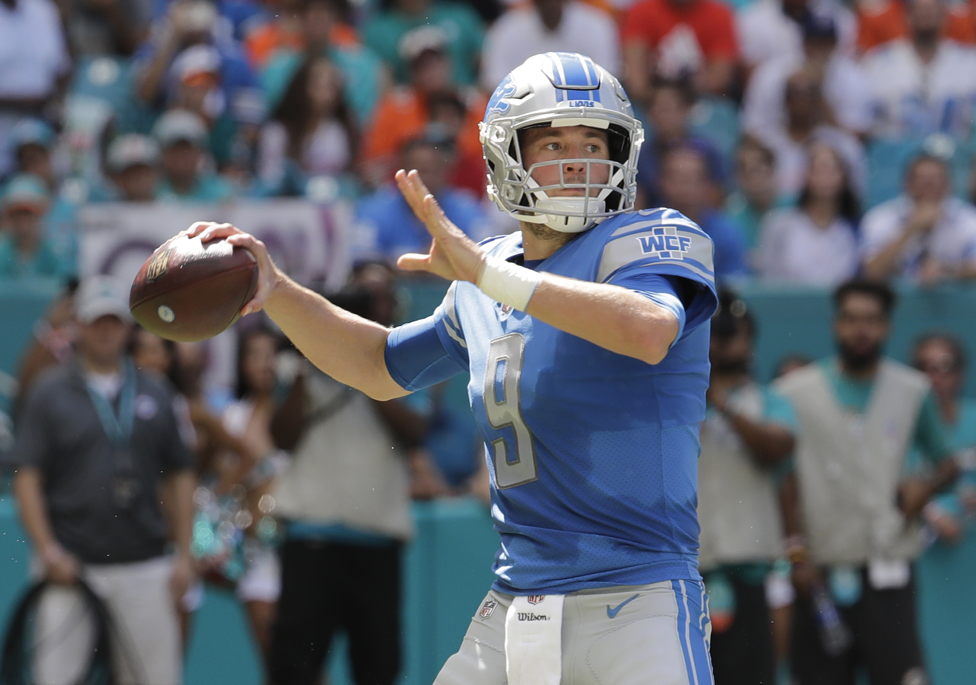 Johnson’s 158 yards rushing help Lions beat Dolphins 32-21