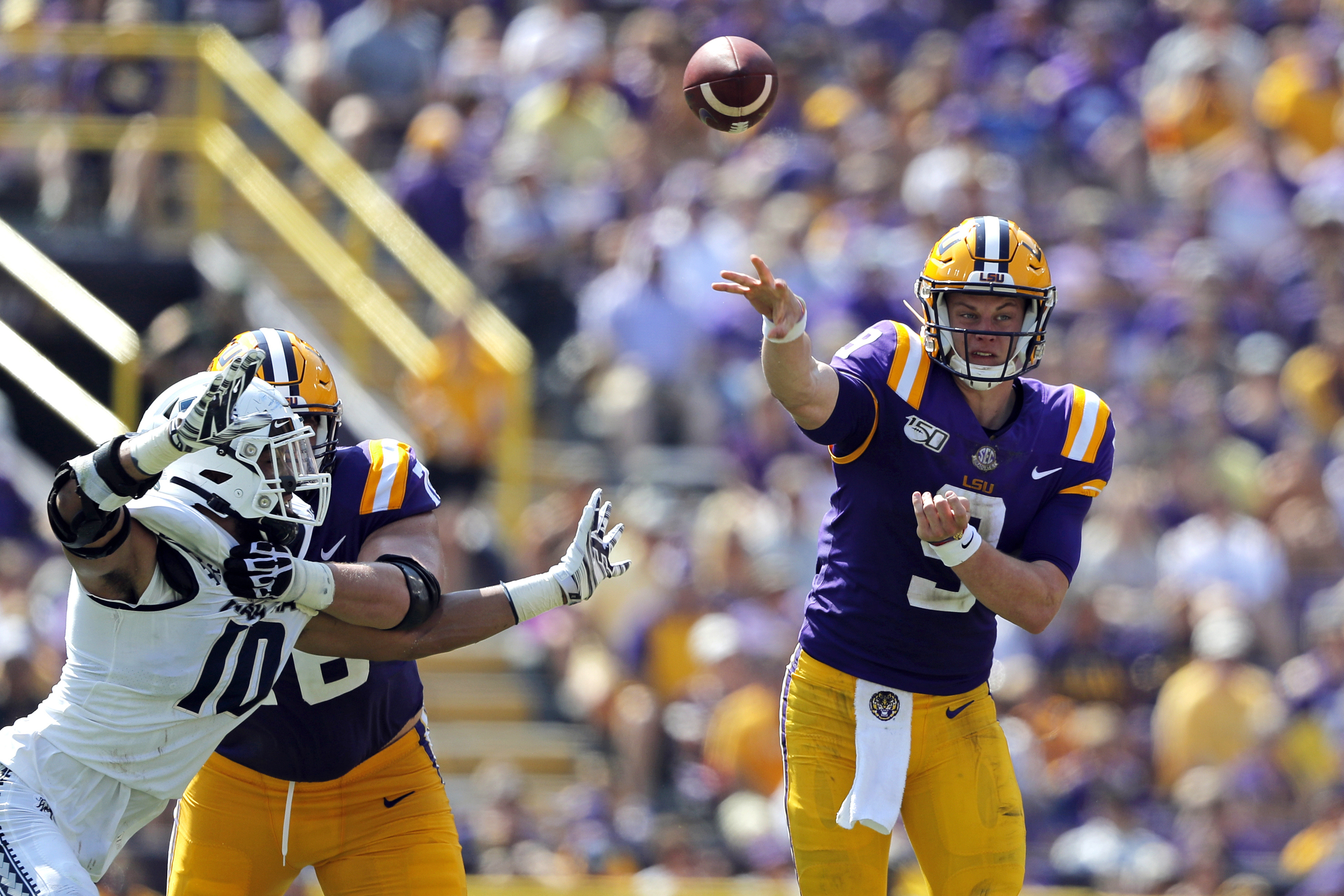 Burrow makes history as No. 5 LSU beats Utah State, 42-6