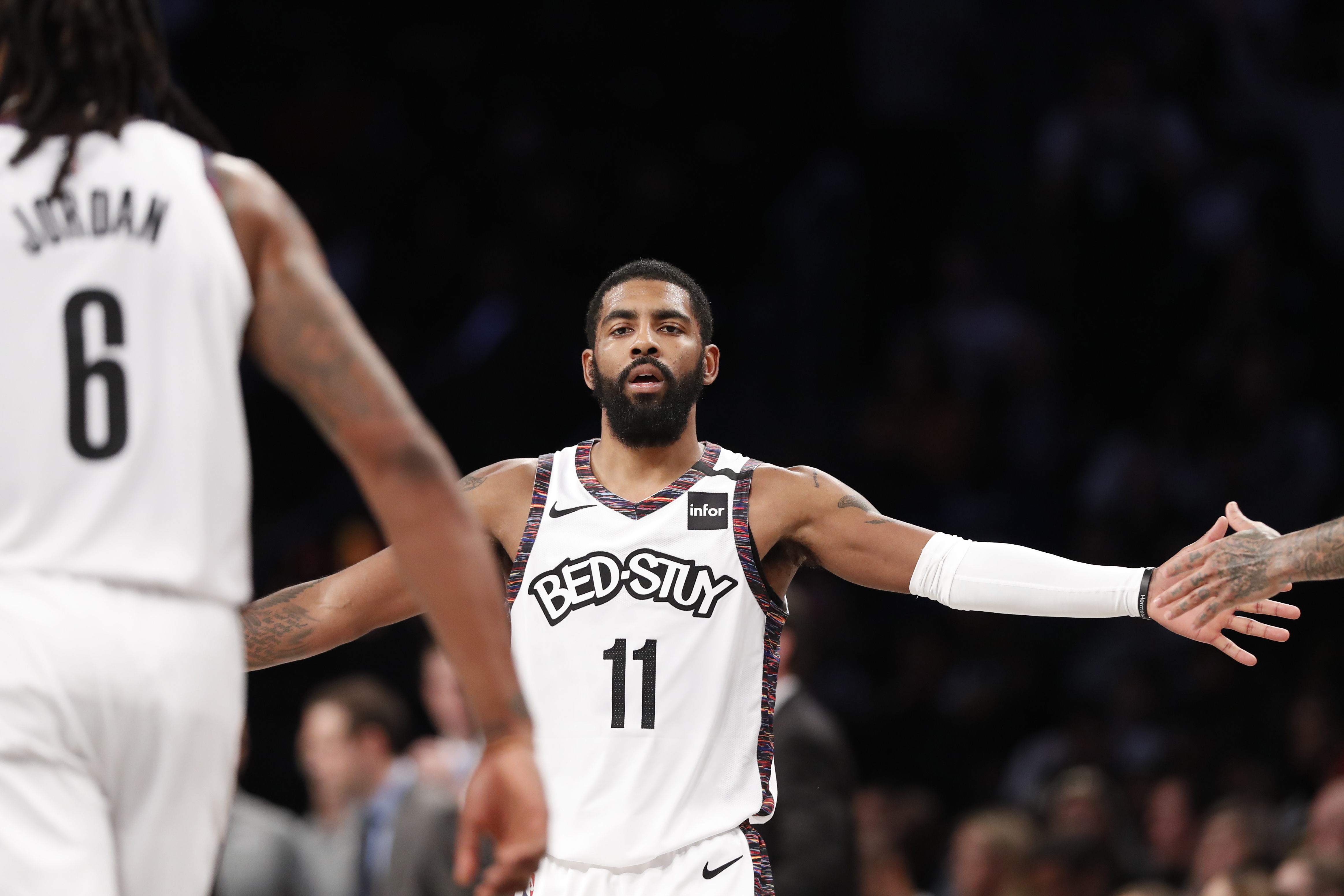 Irving returns with 21 points, Nets pound Hawks 108-86