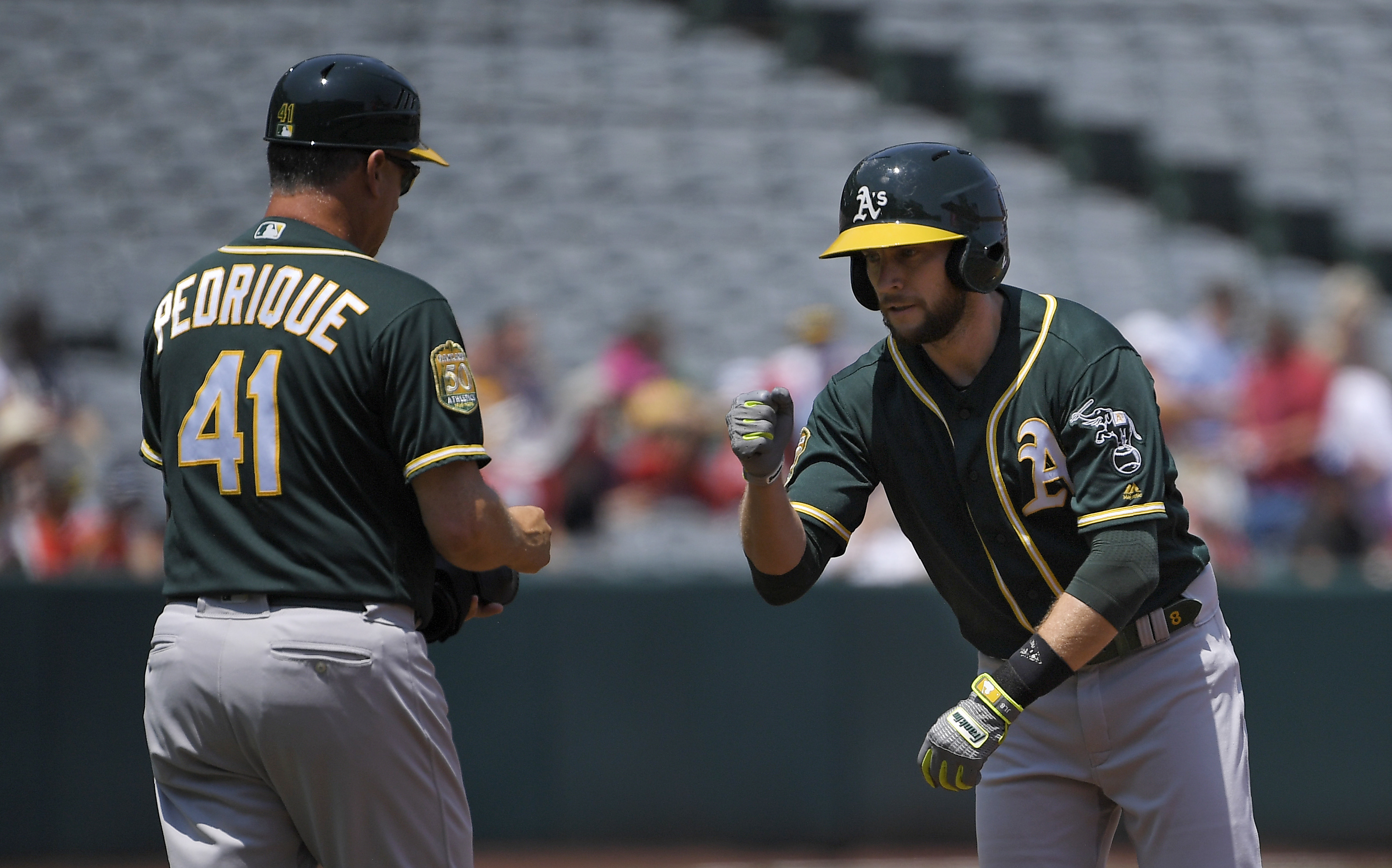 Lowrie homers, exceeds 1,000 career hits as A’s edge Angels