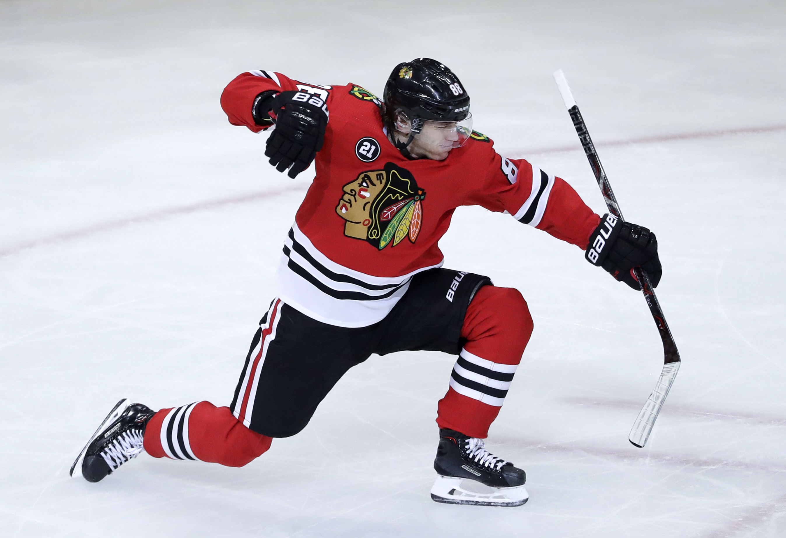 Blackhawks beat  Red Wings 5-2 for 7th straight victory