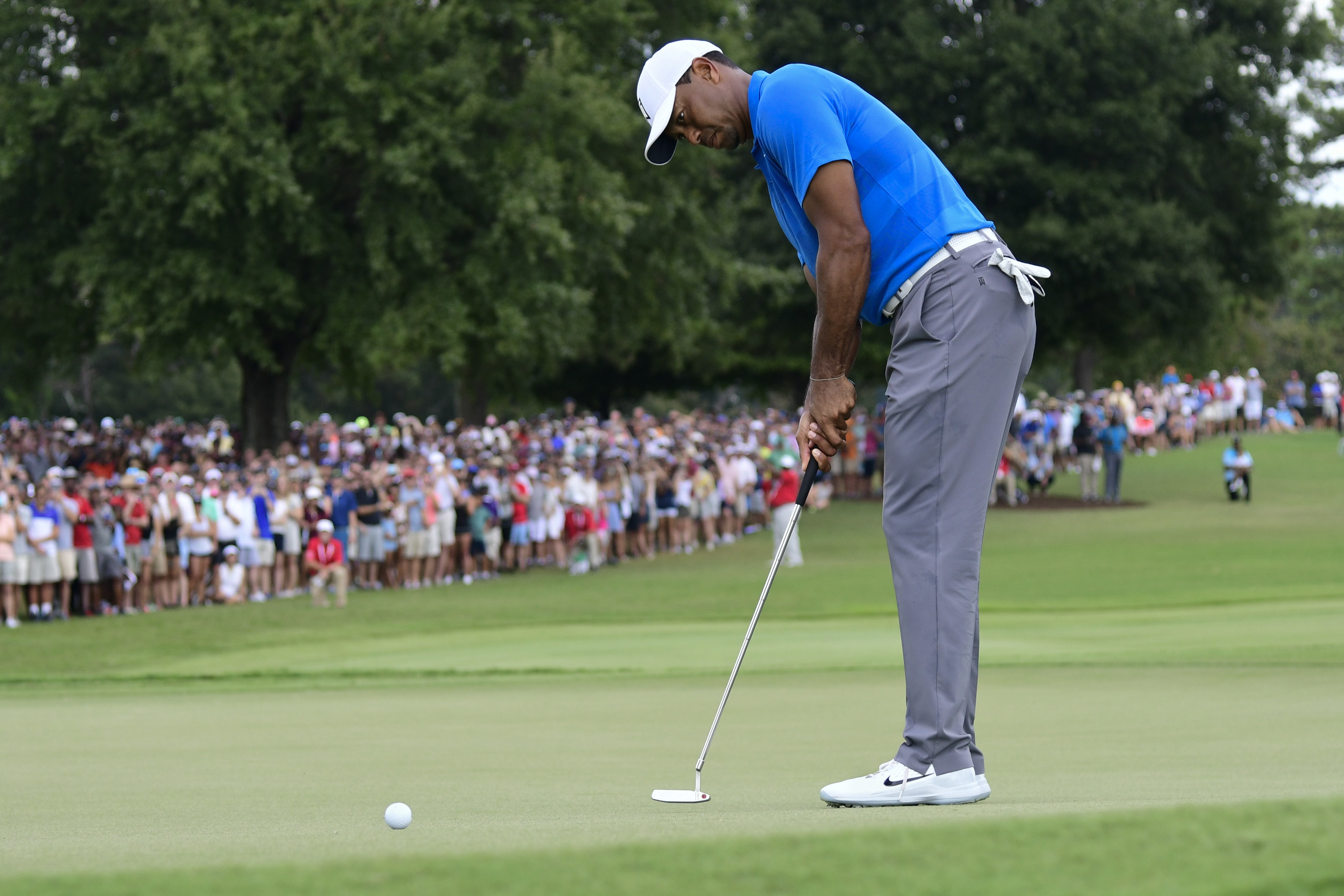 The Latest: Woods headed for victory, Rose headed for Cup