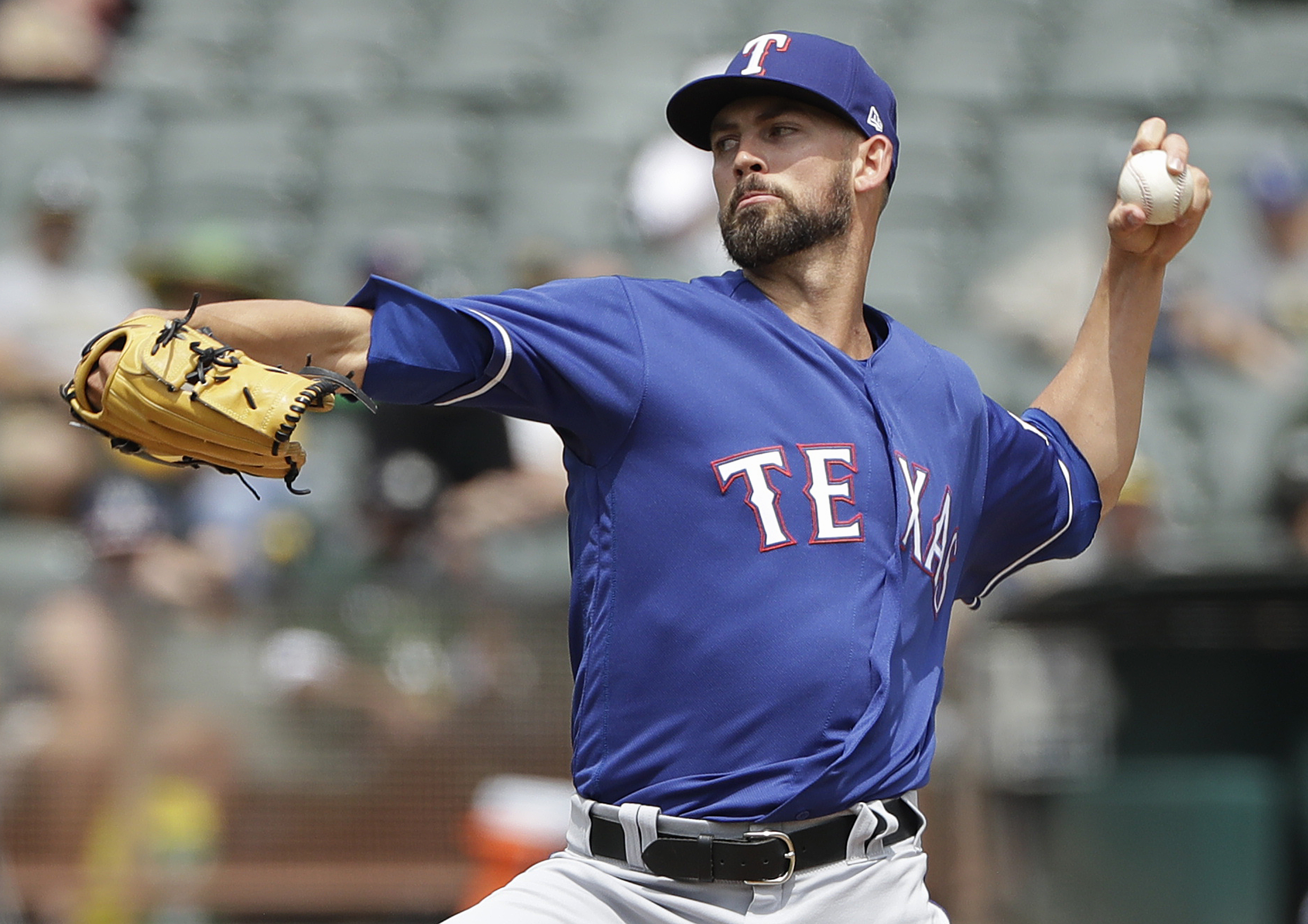 Rangers go deep twice to back Minor in 4-2 win over A’s