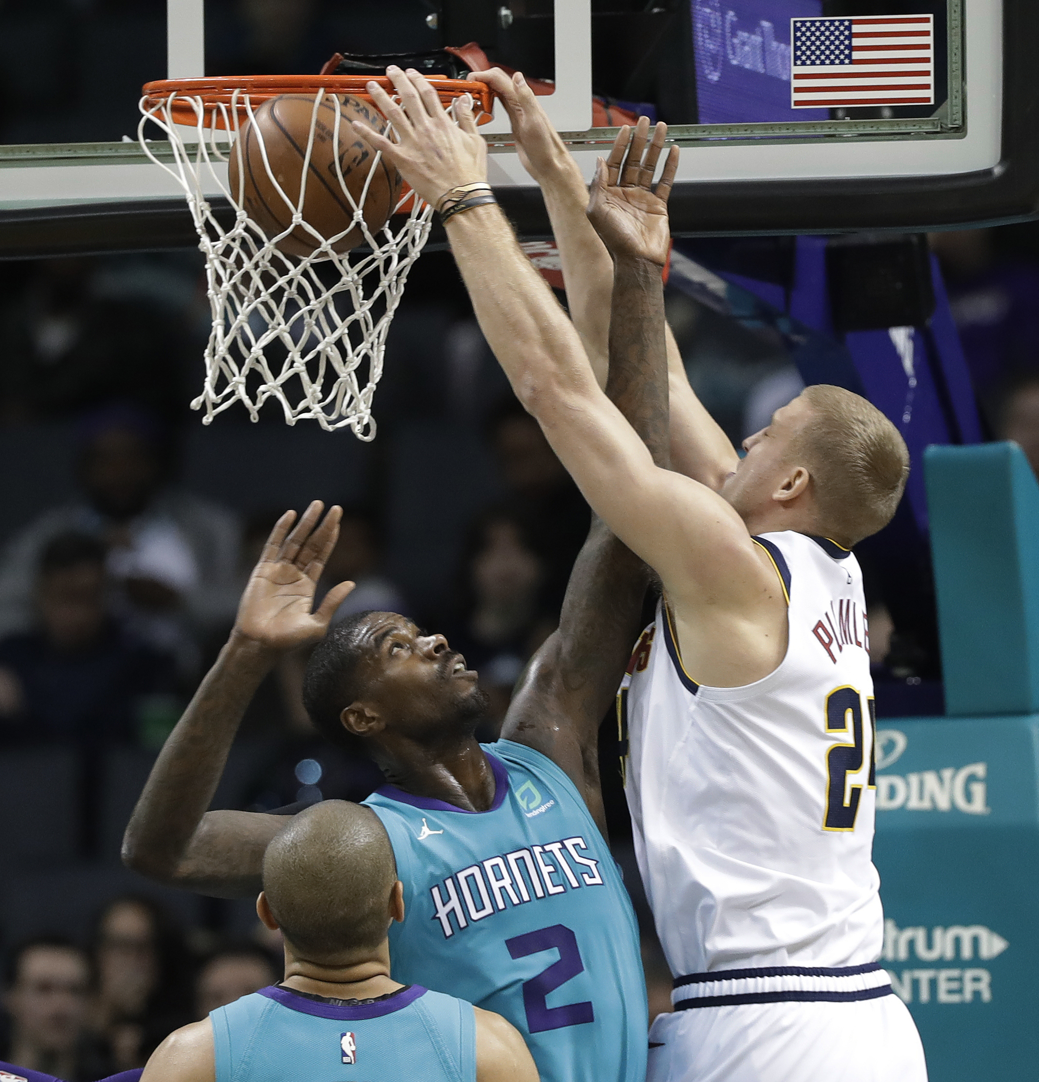 Walker scores 21, Hornets snap Nuggets’ 7-game win streak