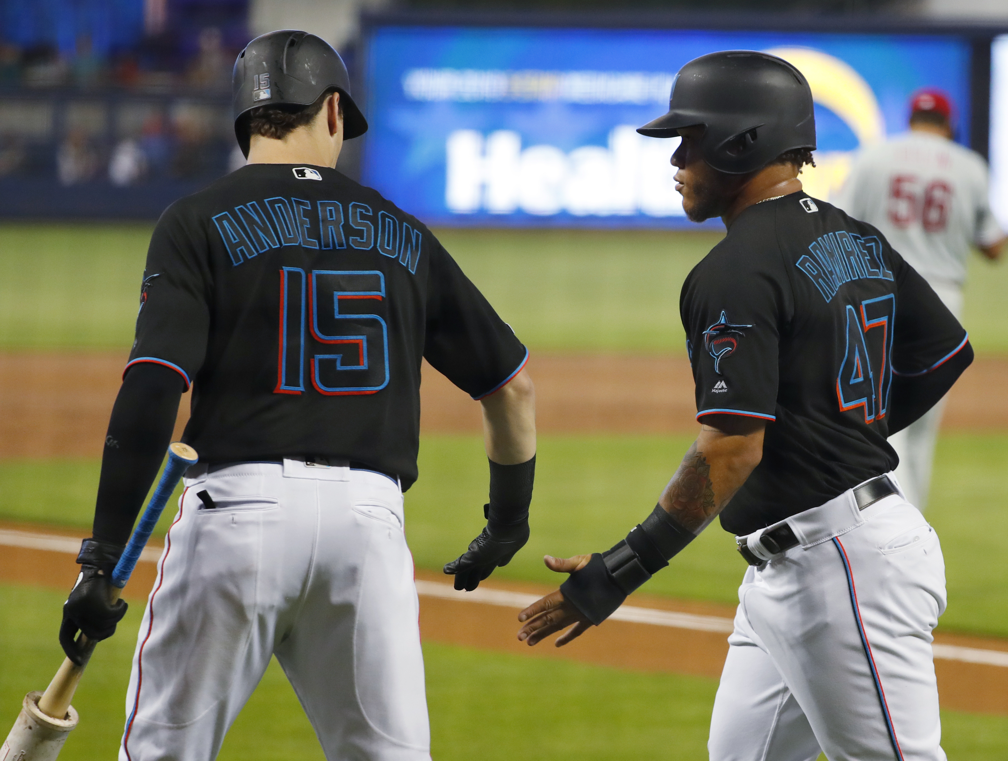 Marlins rally from 5-run deficit to beat Phillies, 9-6