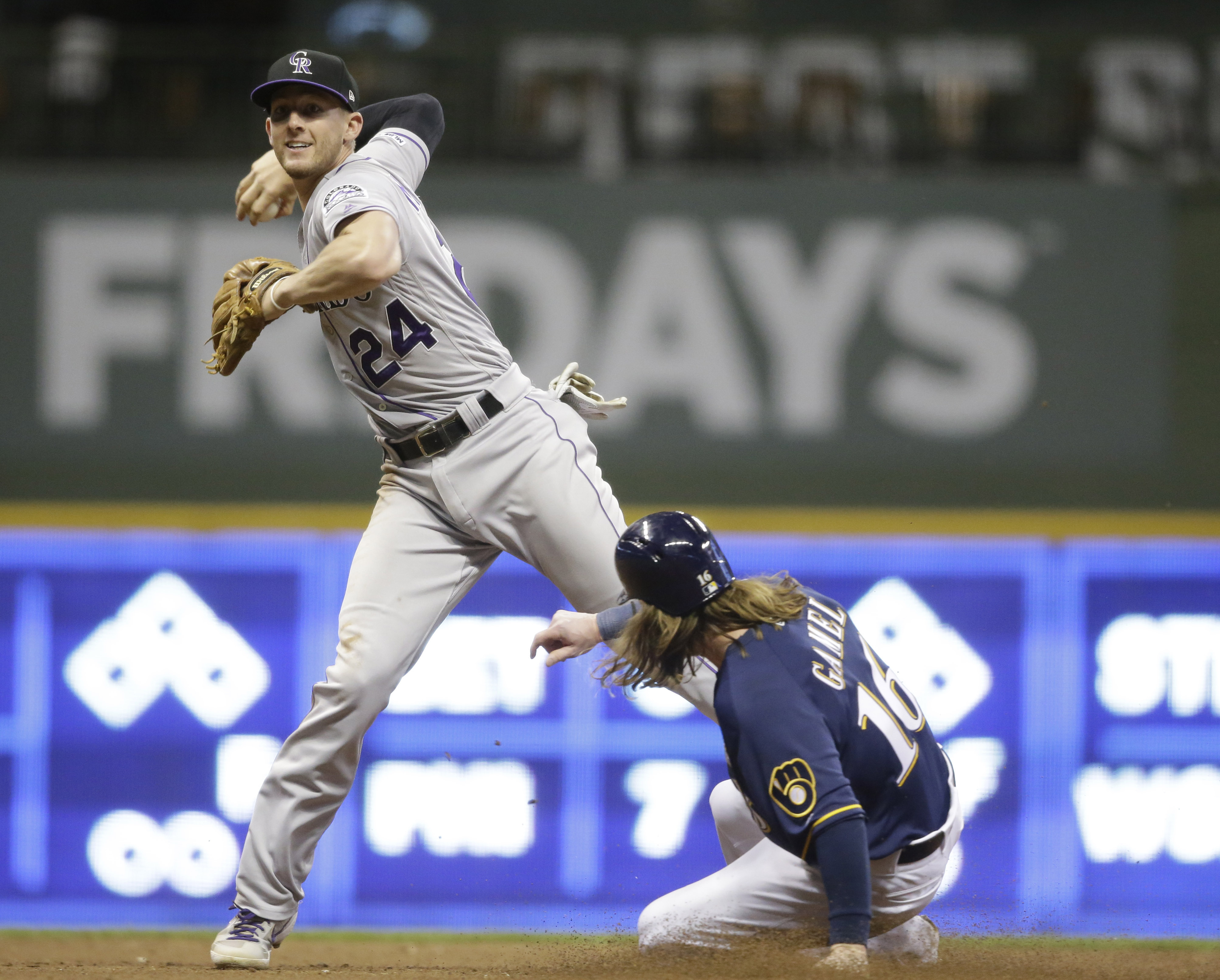 Arenado, Dahl, Tapia HRs lead Rockies over Brewers 11-6