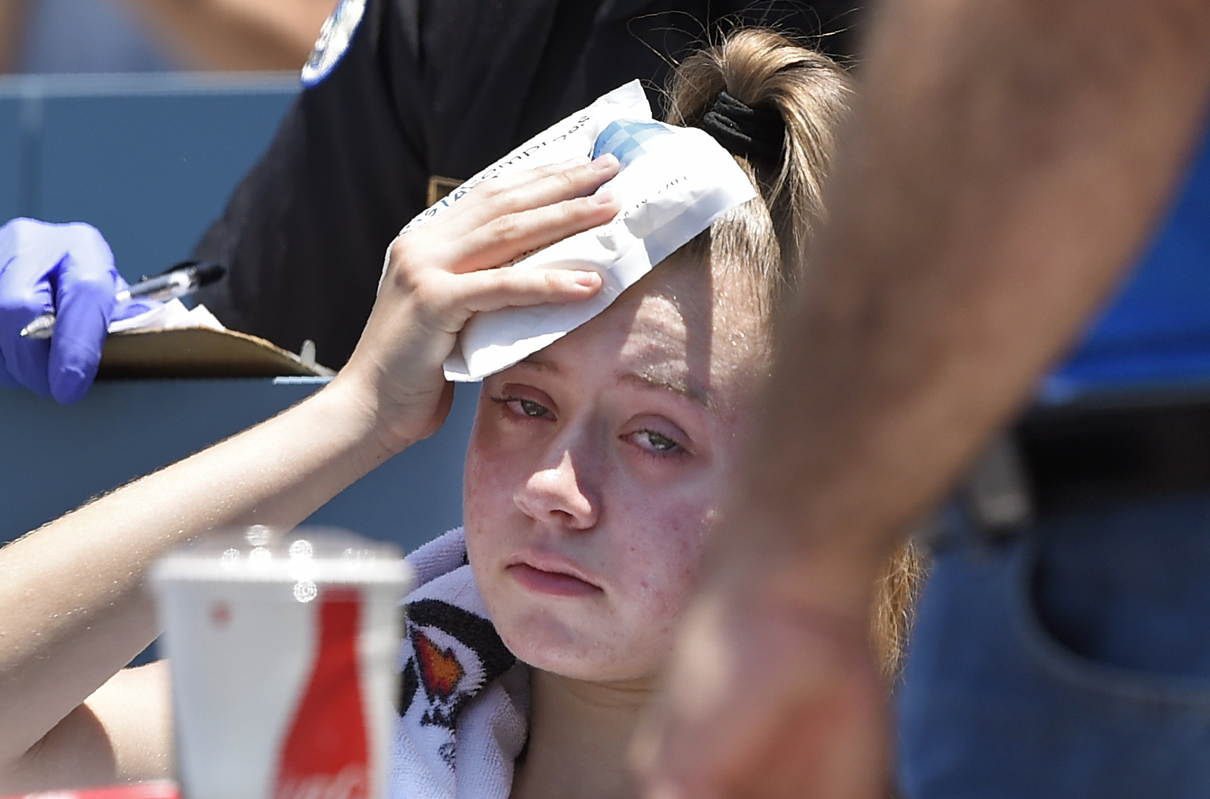 Day after girl struck by foul, Dodgers studying more netting