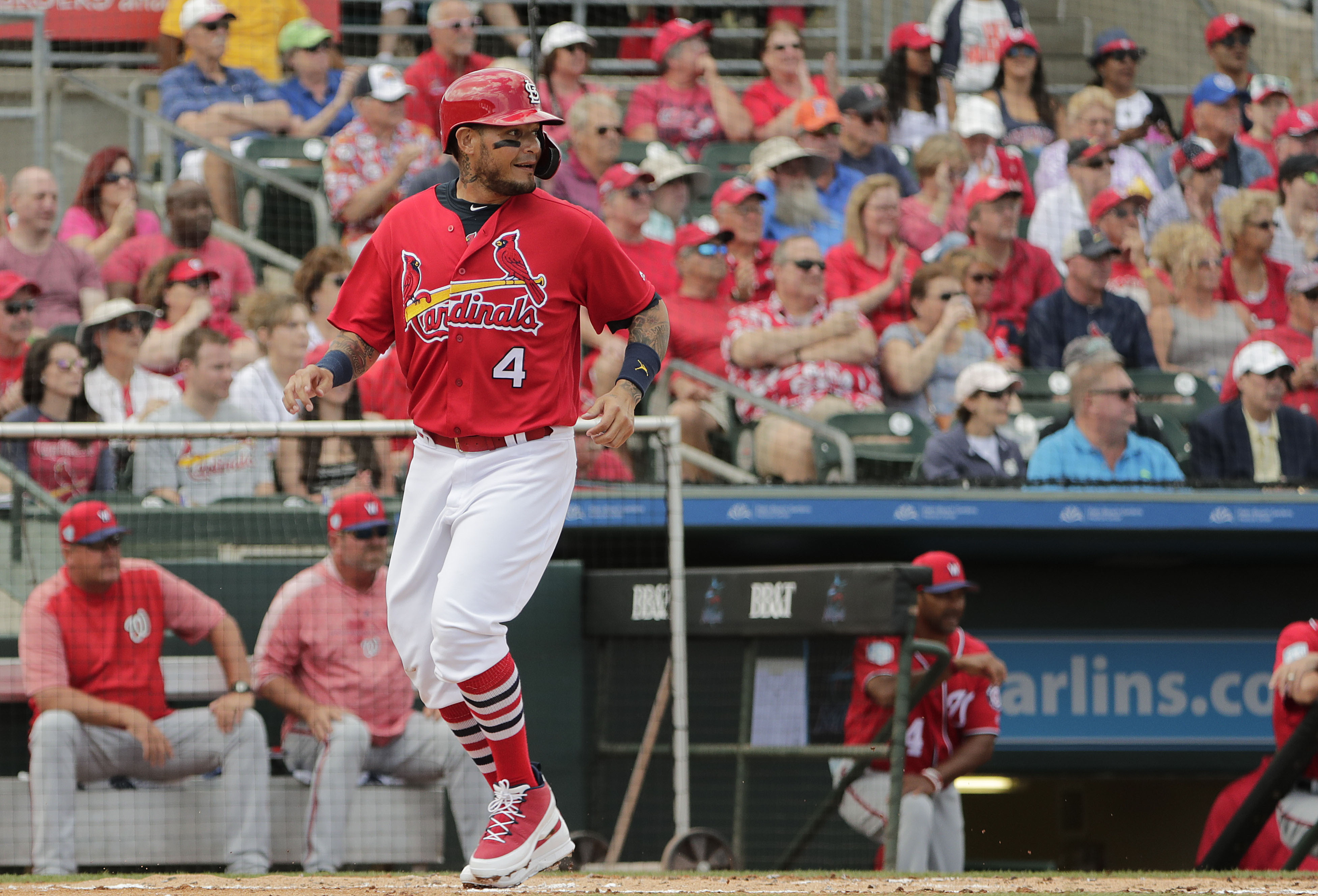 Cardinals’ Yadier Molina singles in return from knee surgery