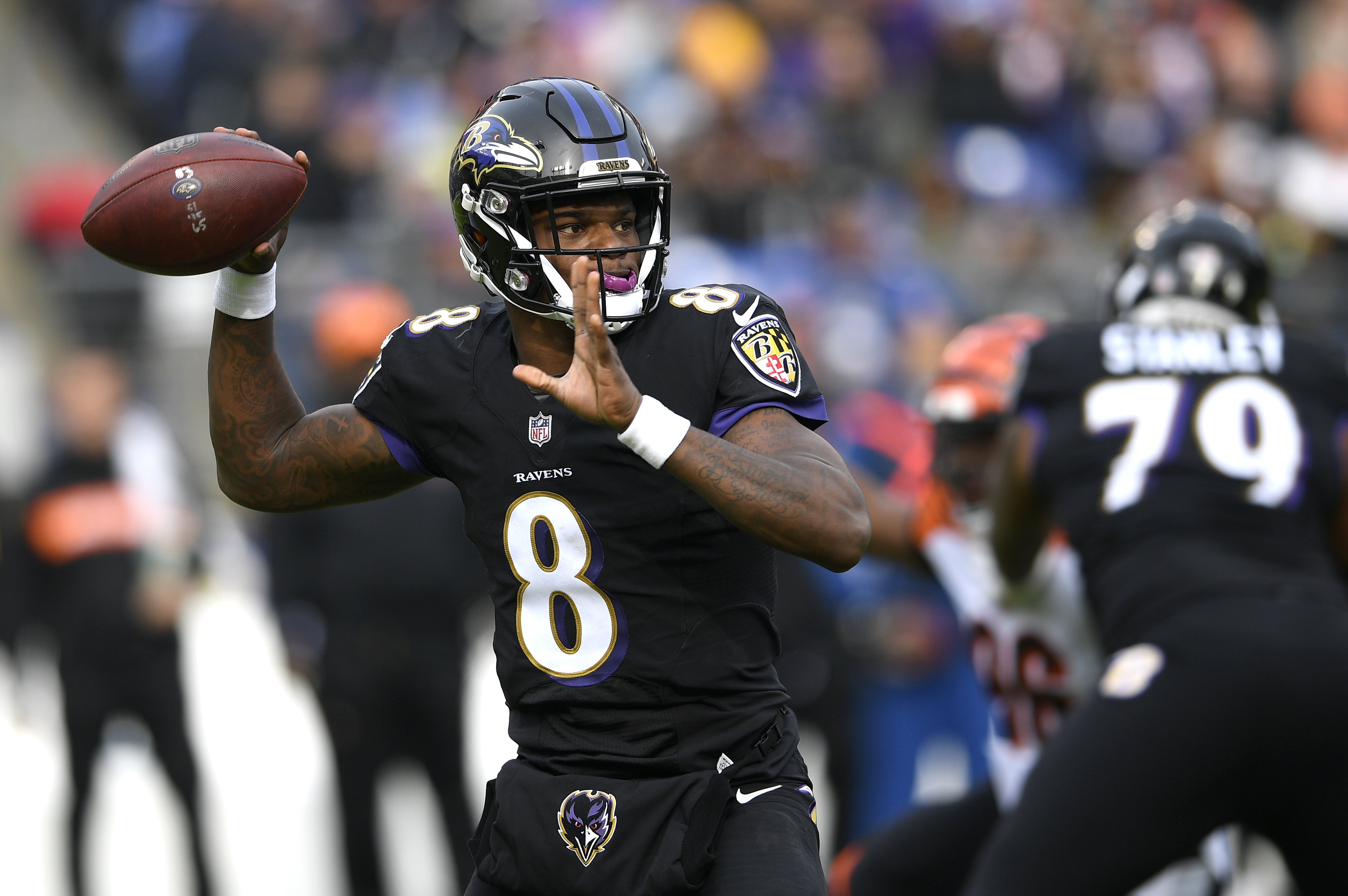 Jackson carries 27 times, lifts Ravens past Bengals 24-21