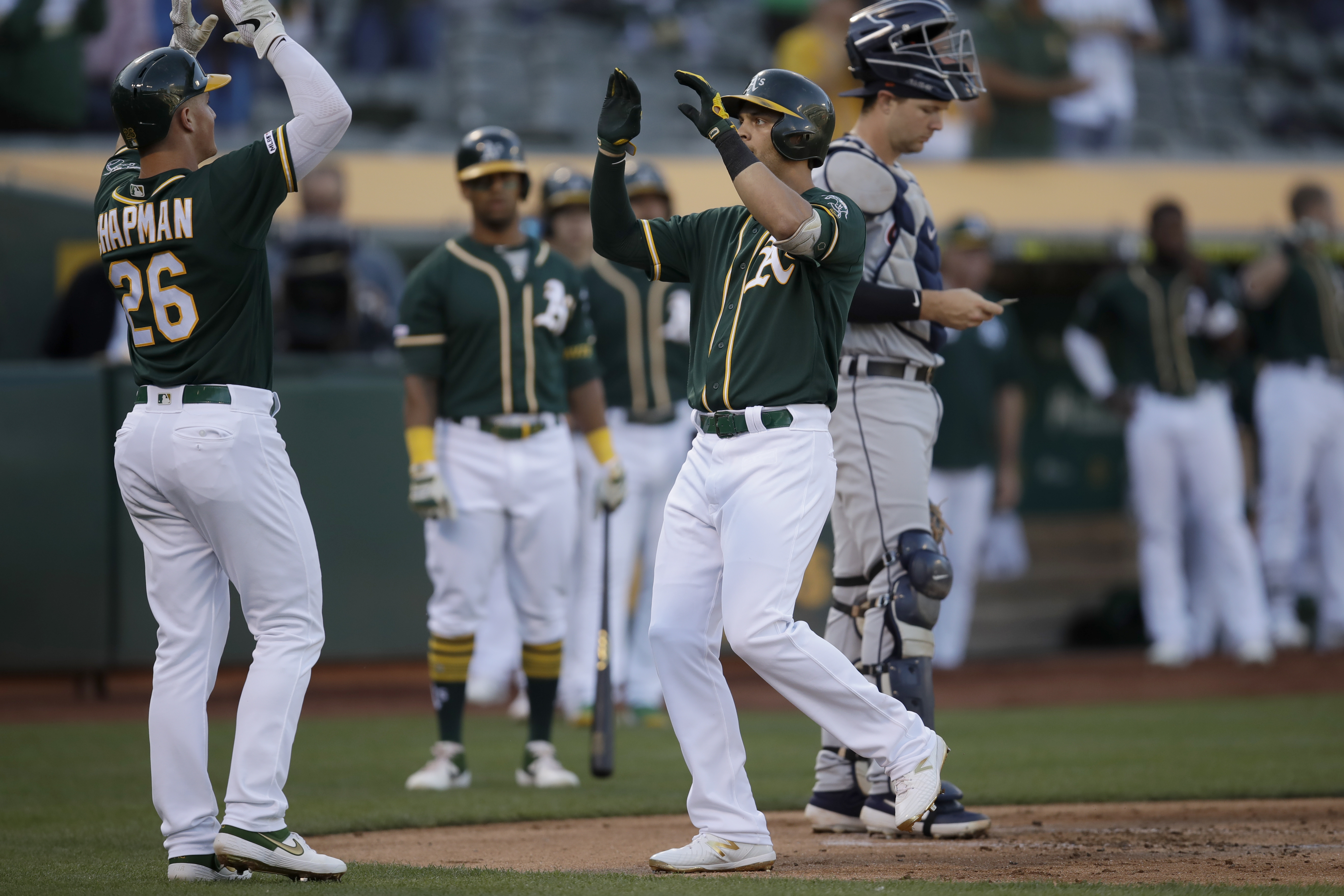 A's beat Tigers 7-3 in game resumed nearly 4 months later