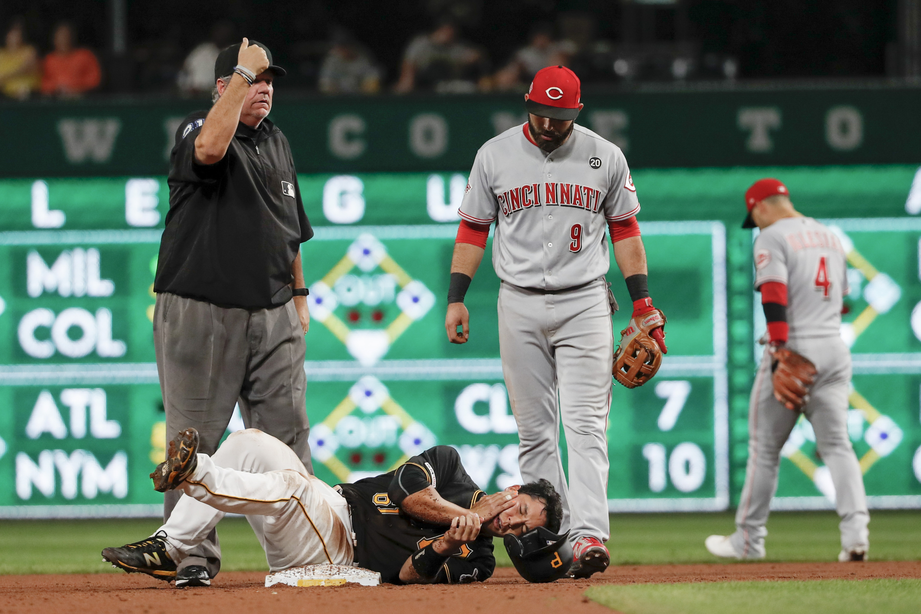 Iglesias lifts Reds to 4-2 win over Pirates in 12 innings