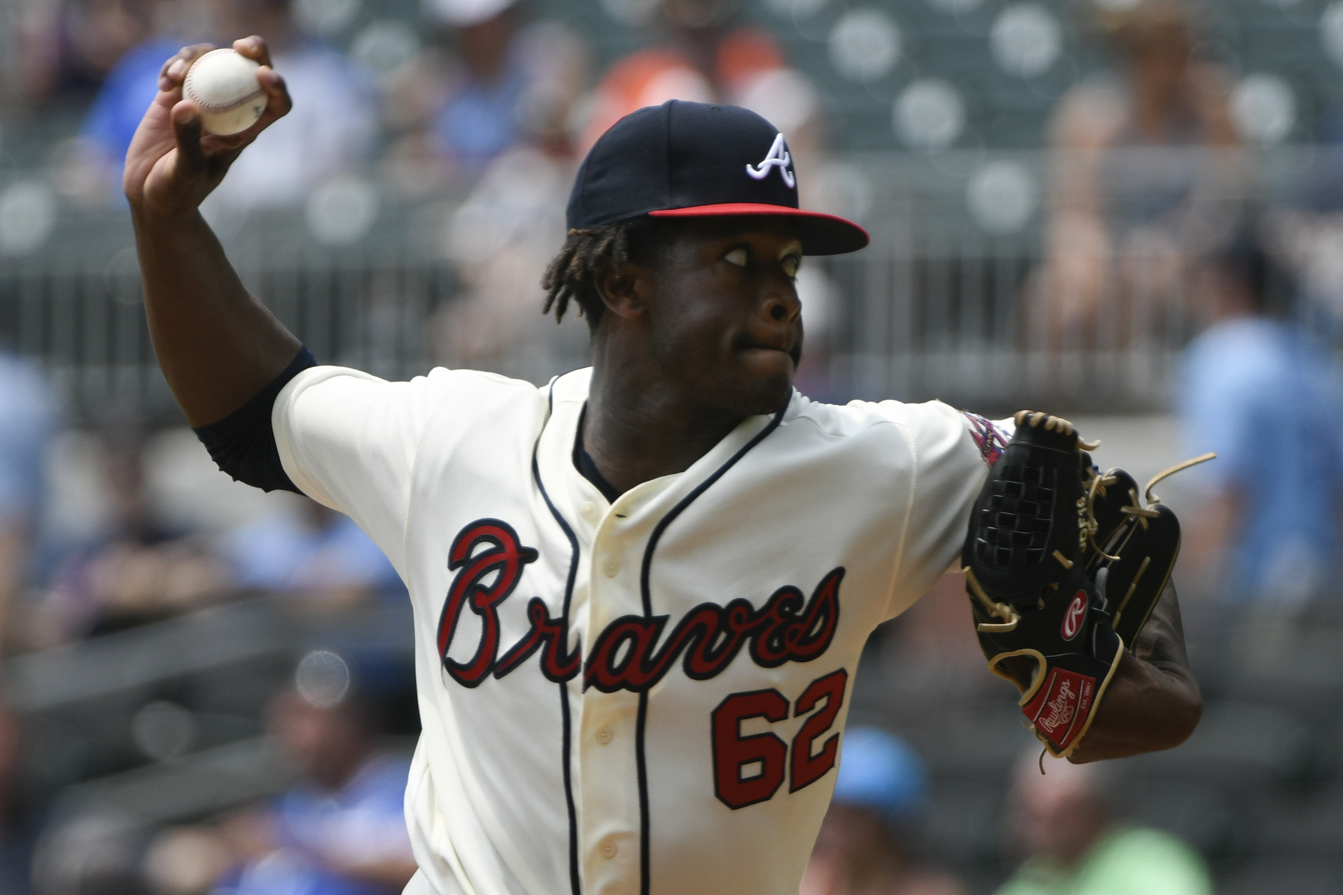 Toussaint wins big league debut, Braves rout Marlins 9-1