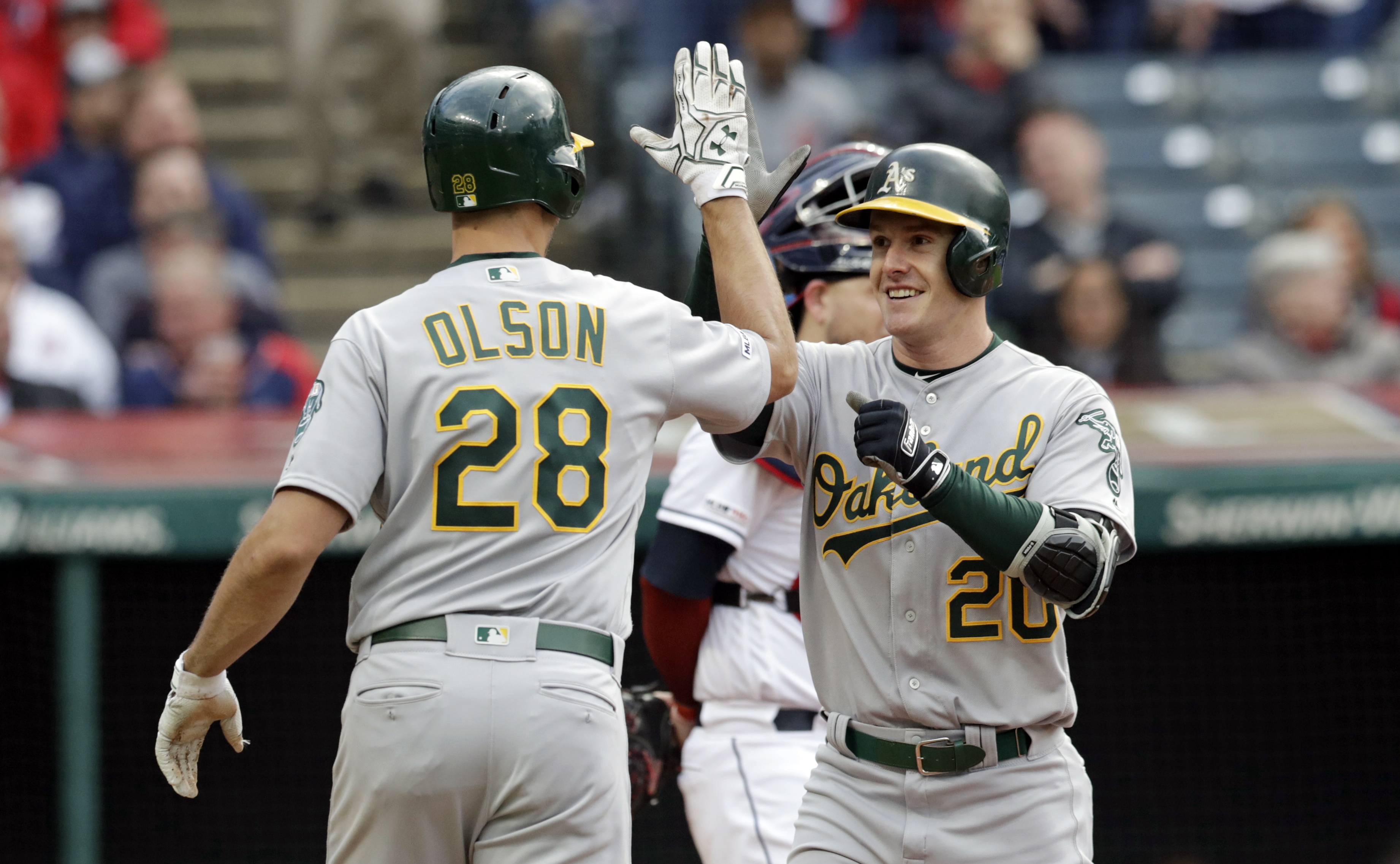 Canha’s pinch-hit homer off Bauer lifts A’s past Indians 5-3