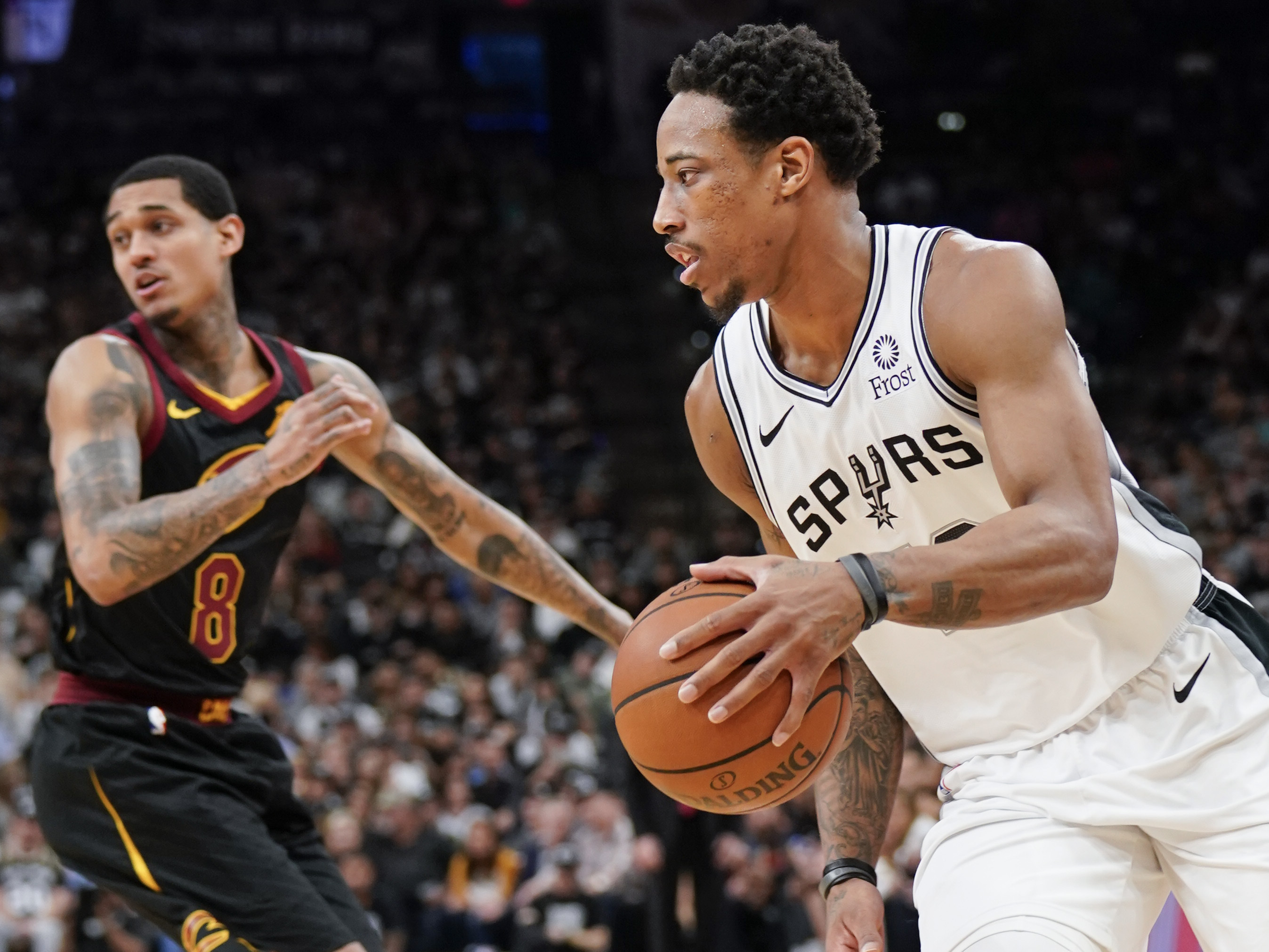 DeRozan leads Spurs past Cavs as team honors Ginobili