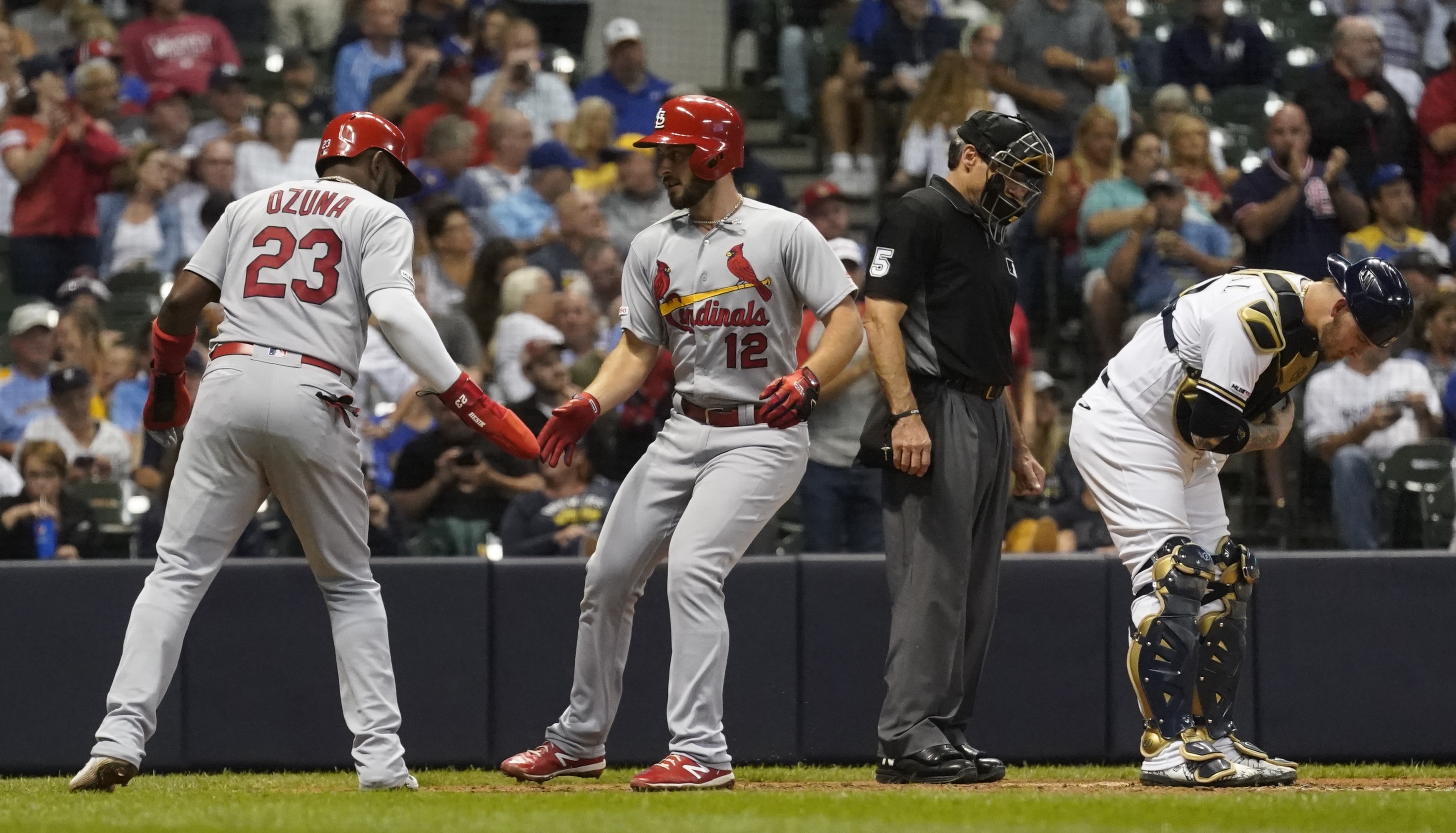 Ozuna helps power Cards past Brewers 12-2